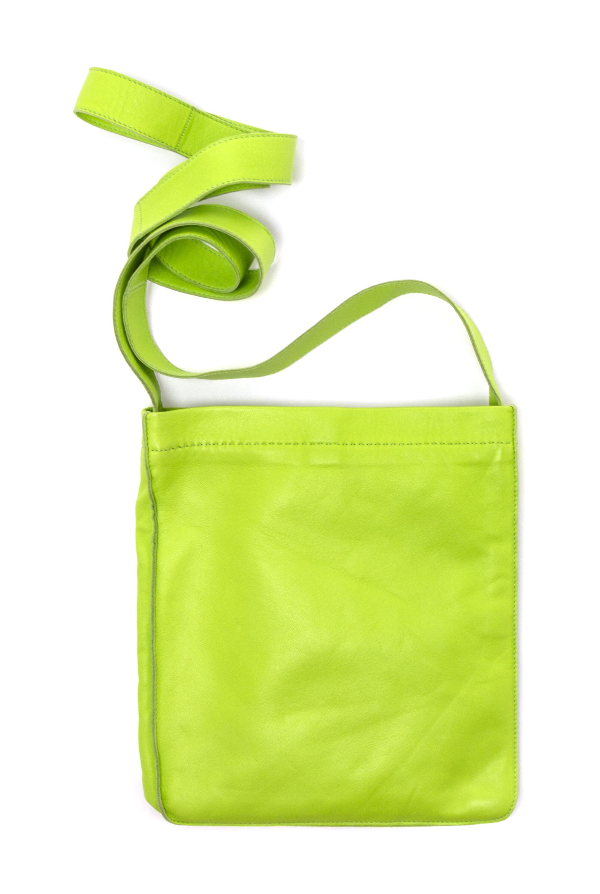 An Hermes Kiwi Agneau Clou de Selle Pouch, 6" x 9" x 1".