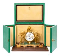A Swiss Gilt Metal and Stone Inset Desk Clock, Mouawad Height 9 3/4 inches. — MODERN