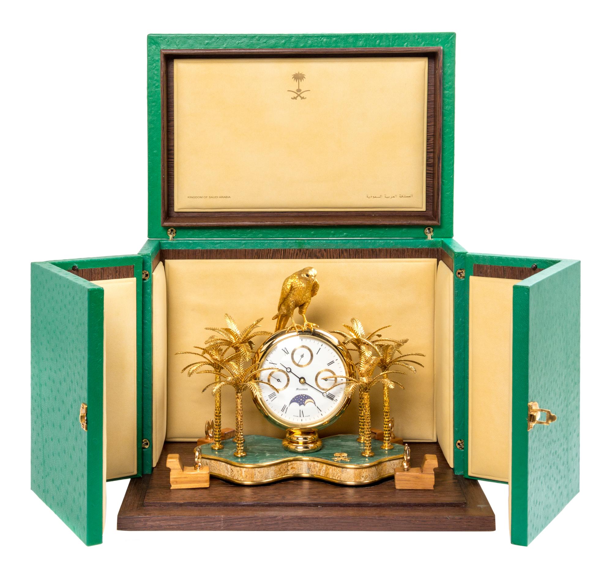 A Swiss Gilt Metal and Stone Inset Desk Clock, Mouawad Height 9 3/4 inches. — MODERN