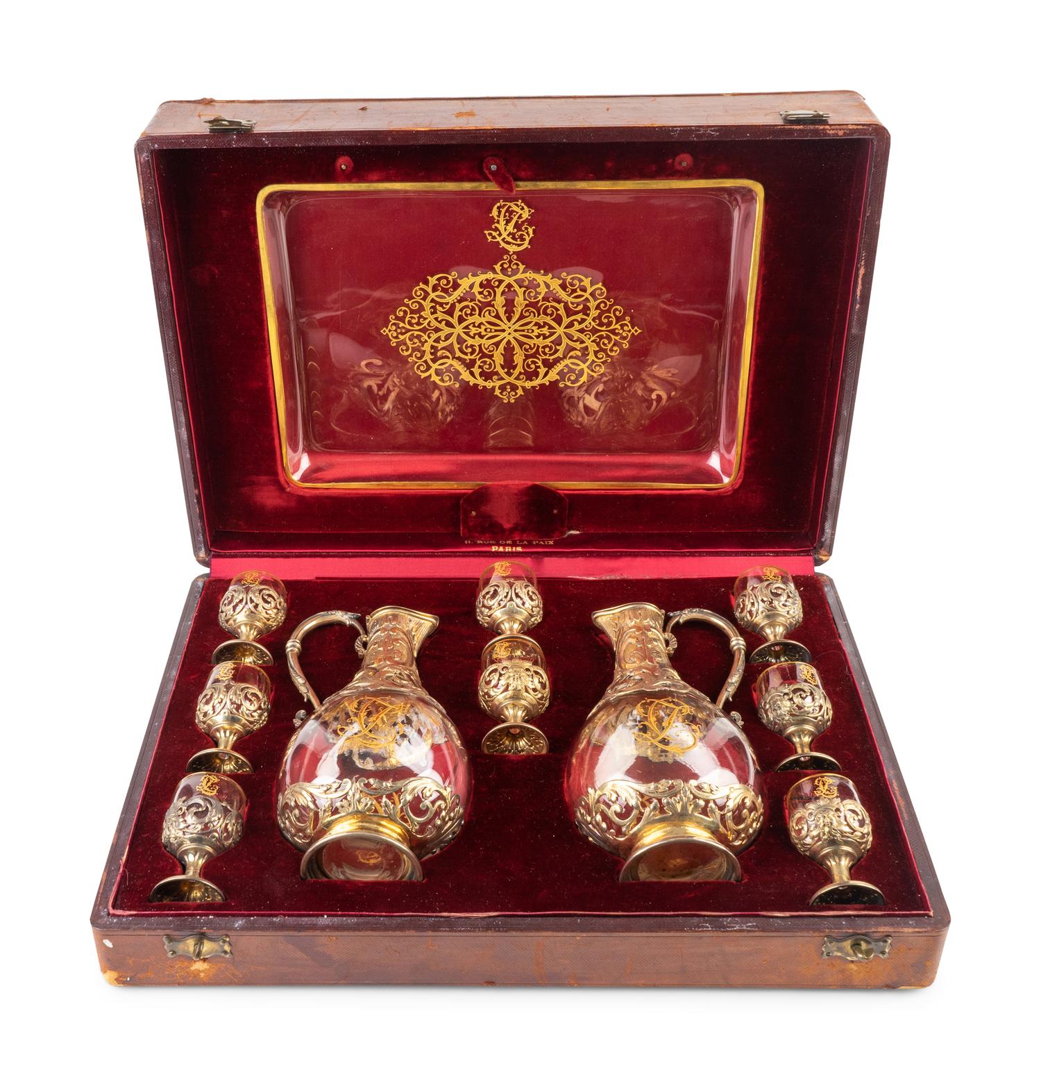 A French Silver Gilt and Crystal Decanter Set — 19TH CENTURY
