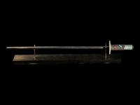 A Nepalese Coral, Jade Turquoise Inset Silver Jade Sword