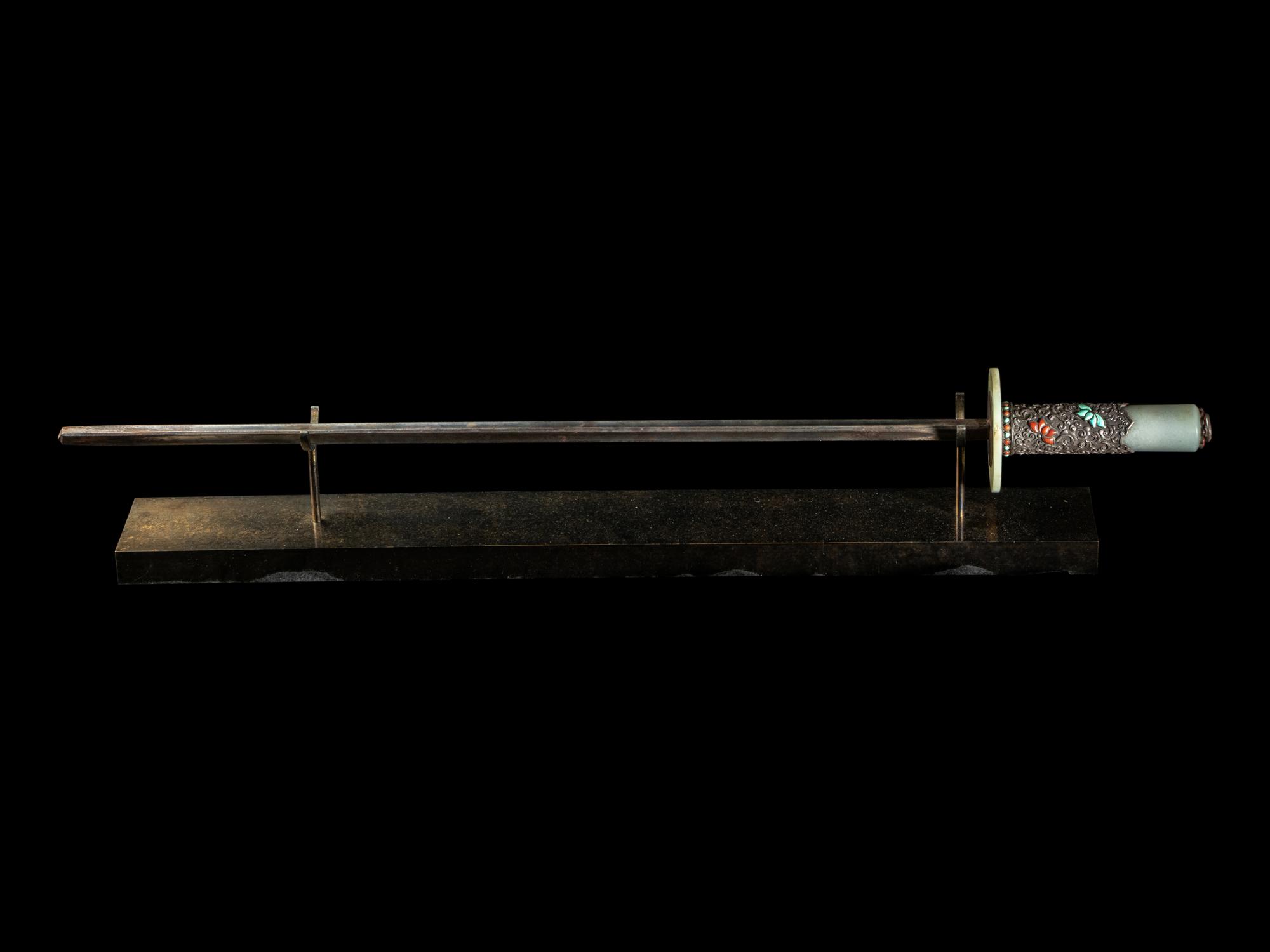 A Nepalese Coral, Jade Turquoise Inset Silver Jade Sword