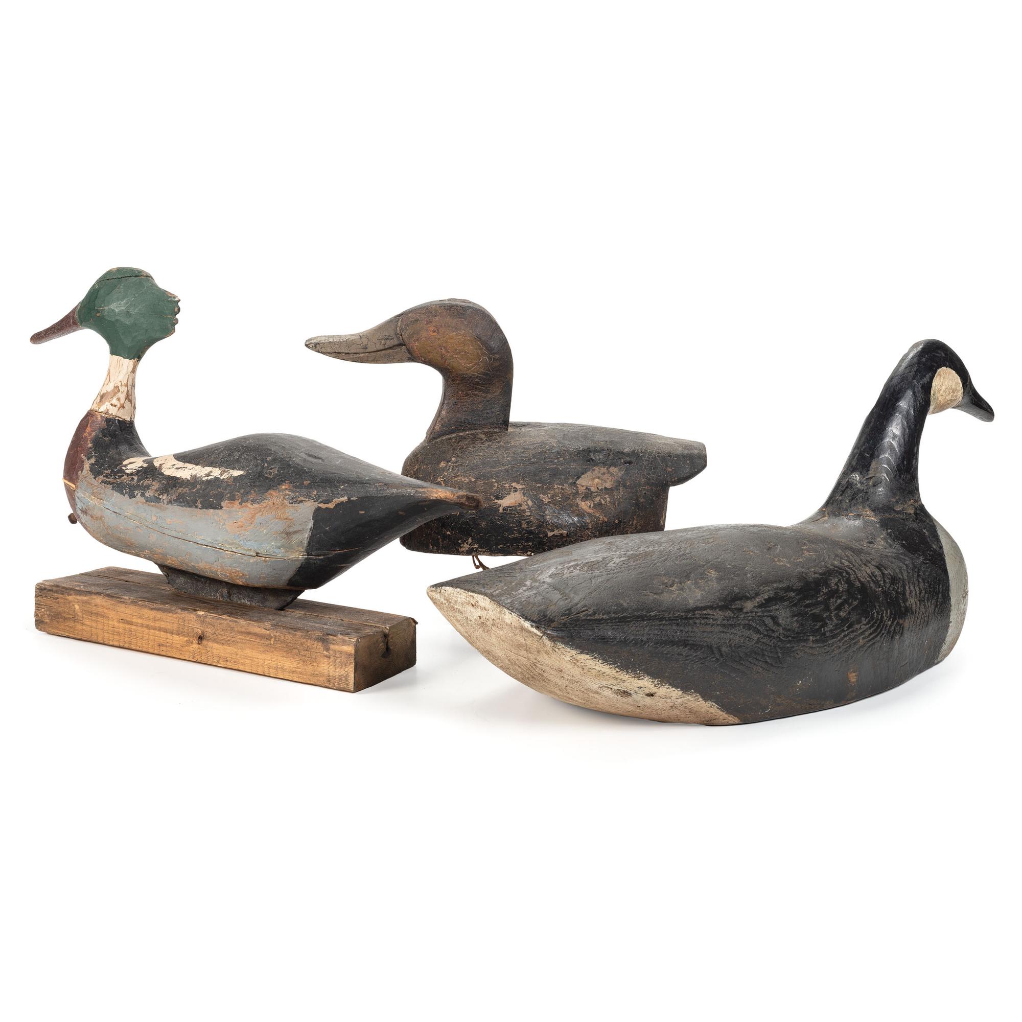 Three Carved and Painted Wooden Duck Decoys