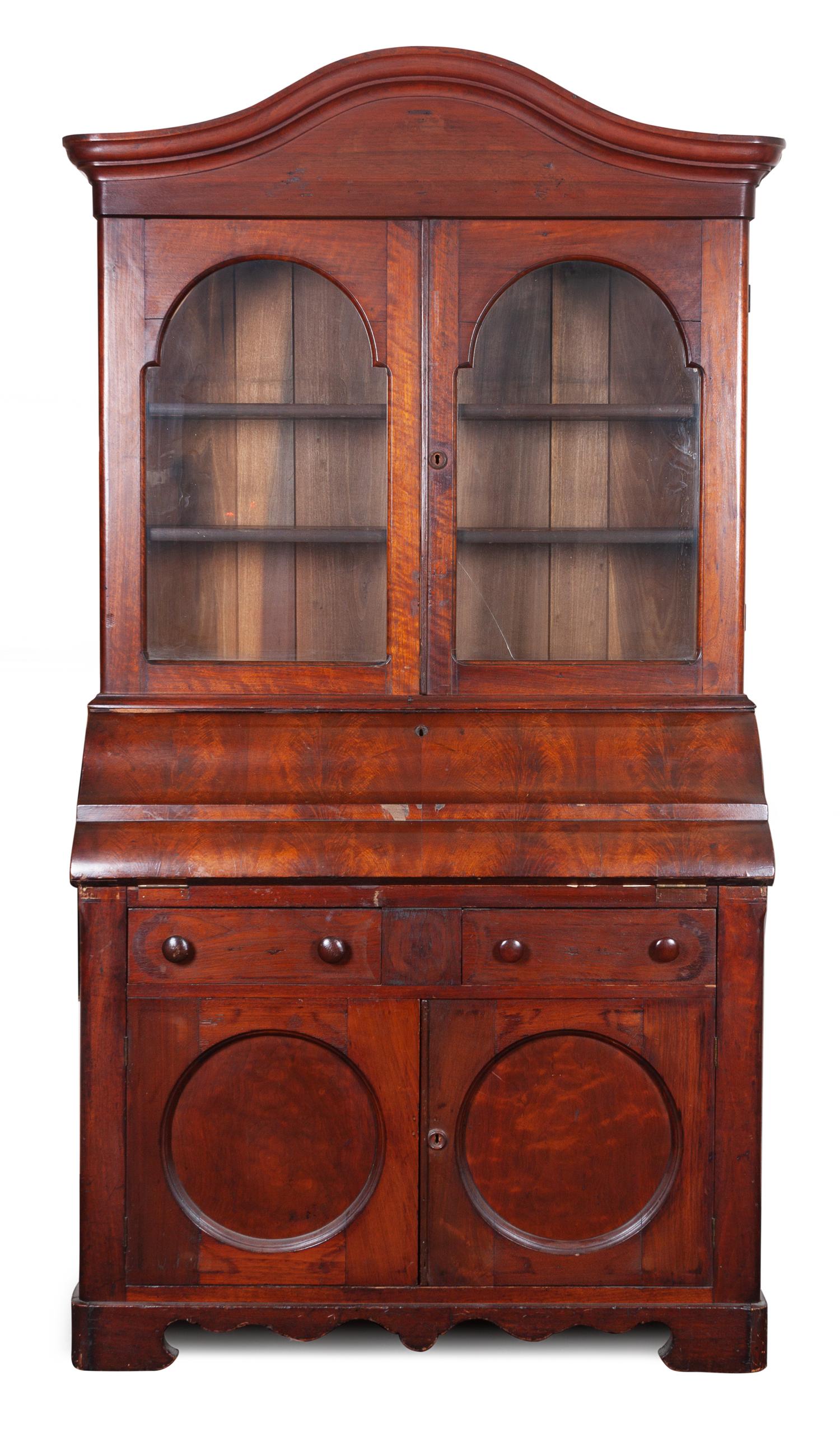 An American Empire Mahogany Secretary Bookcase Height 84 x width 42 3/4 x depth 21 inches. — MID 19TH CENTURY