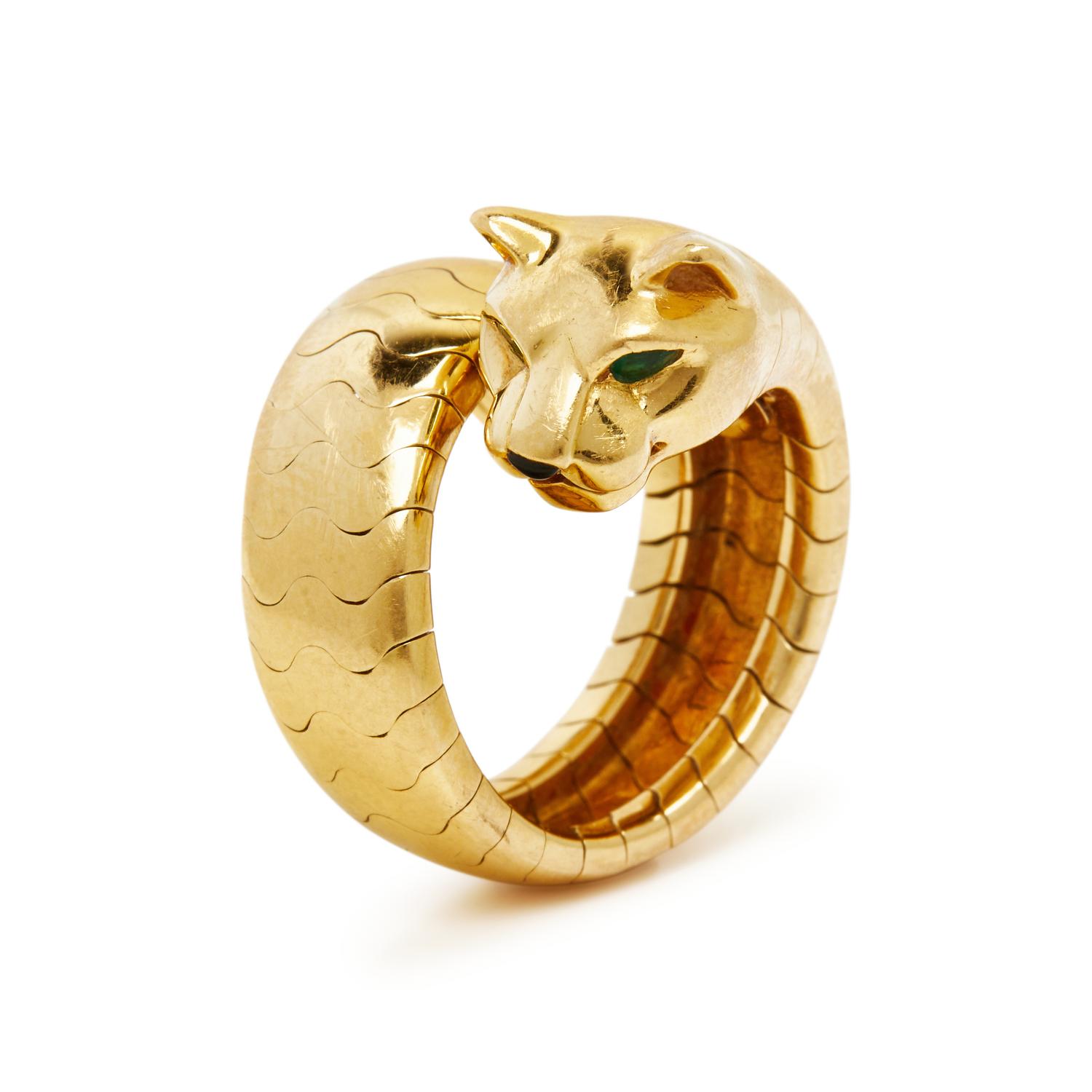 CARTIER, YELLOW GOLD, EMERALD AND ONYX 'PANTHERE' RING