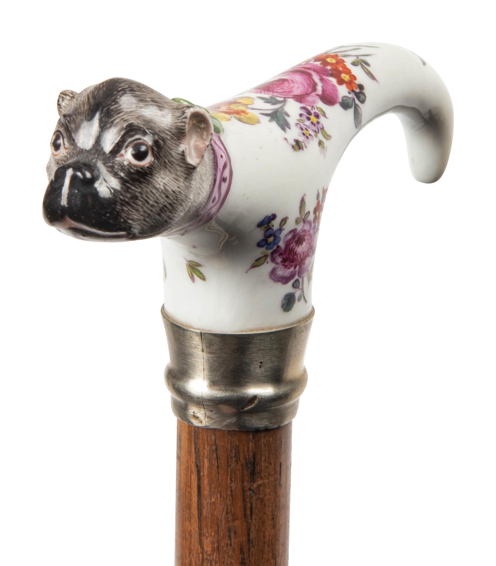 A German Porcelain and Silvered Metal Mounted Walking Stick
