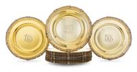 A Set of Twelve American Silver-Gilt Service Plates, Tiffany & Co., New York, NY, Early 20th Century, in the Georgian style with gadroo