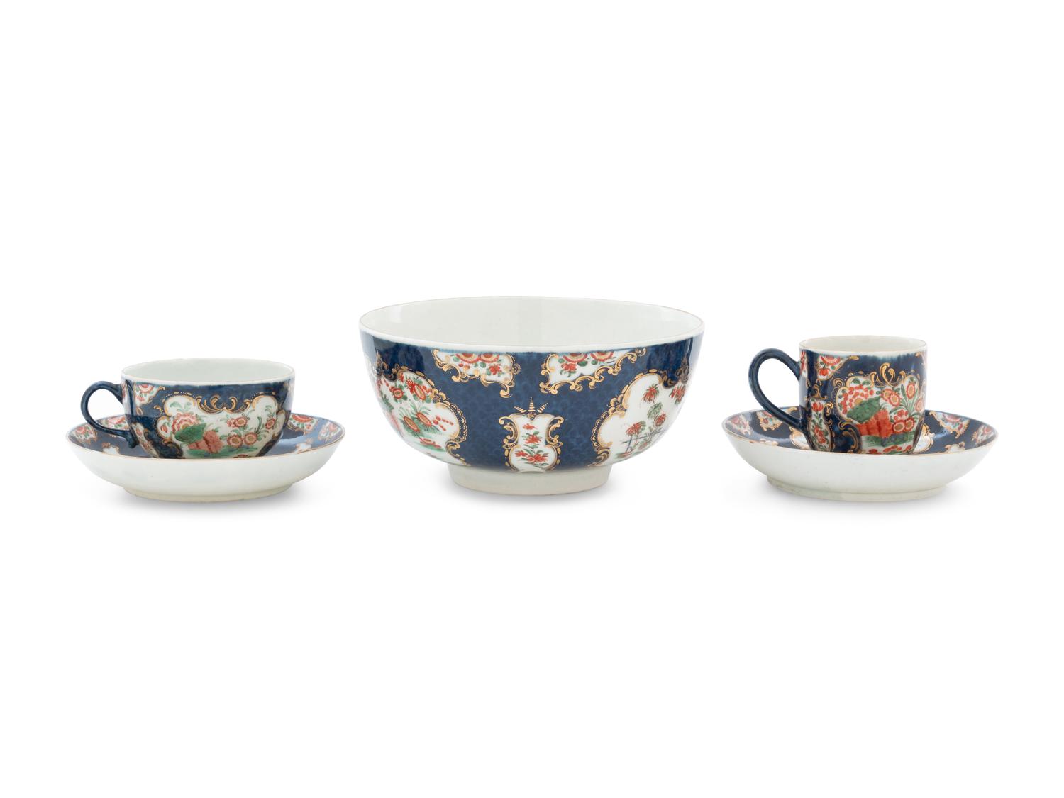 A Royal Worcester Painted and Parcel Gilt Porcelain Tea and Coffee Service