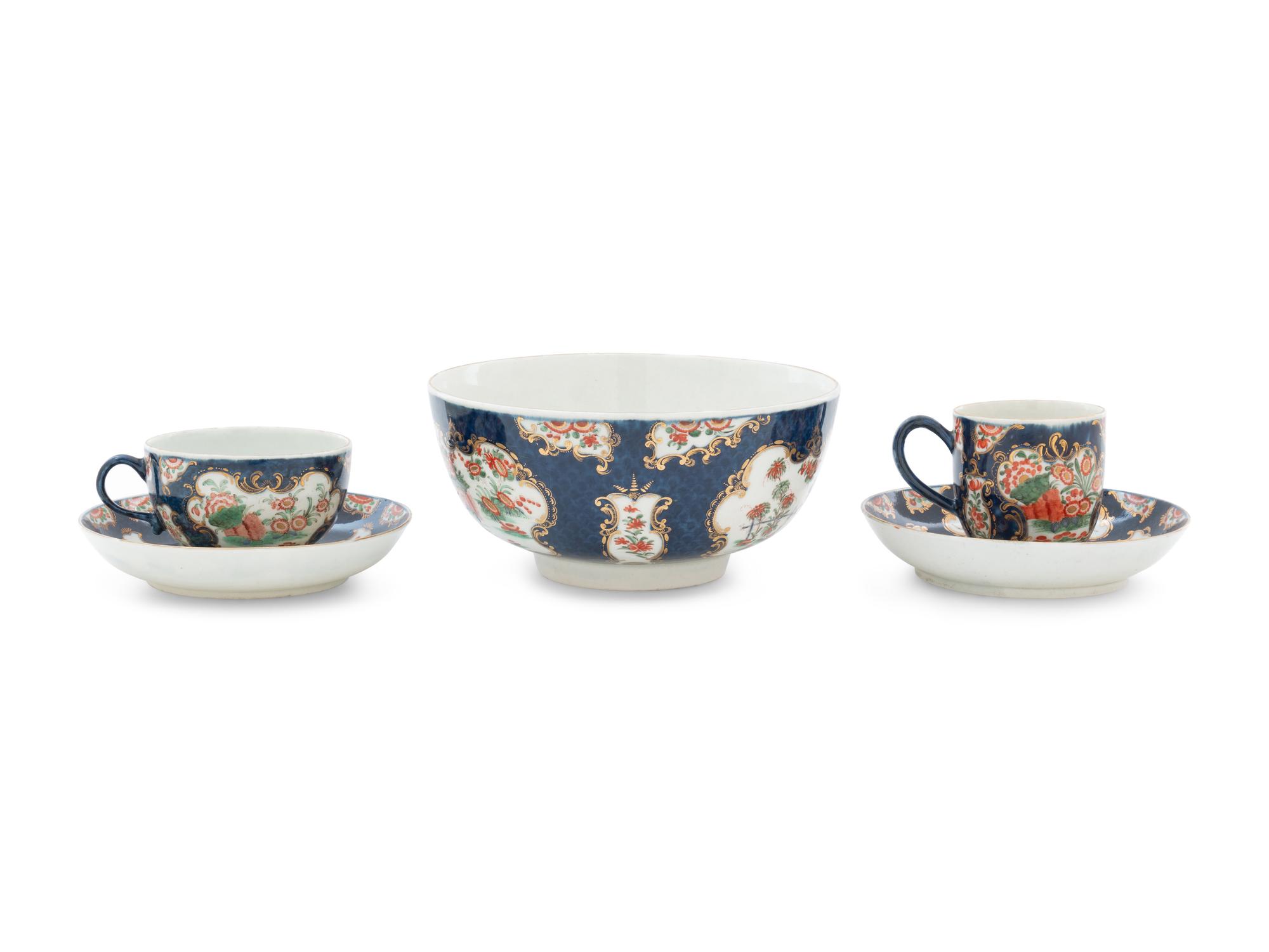 A Royal Worcester Painted and Parcel Gilt Porcelain Tea and Coffee Service