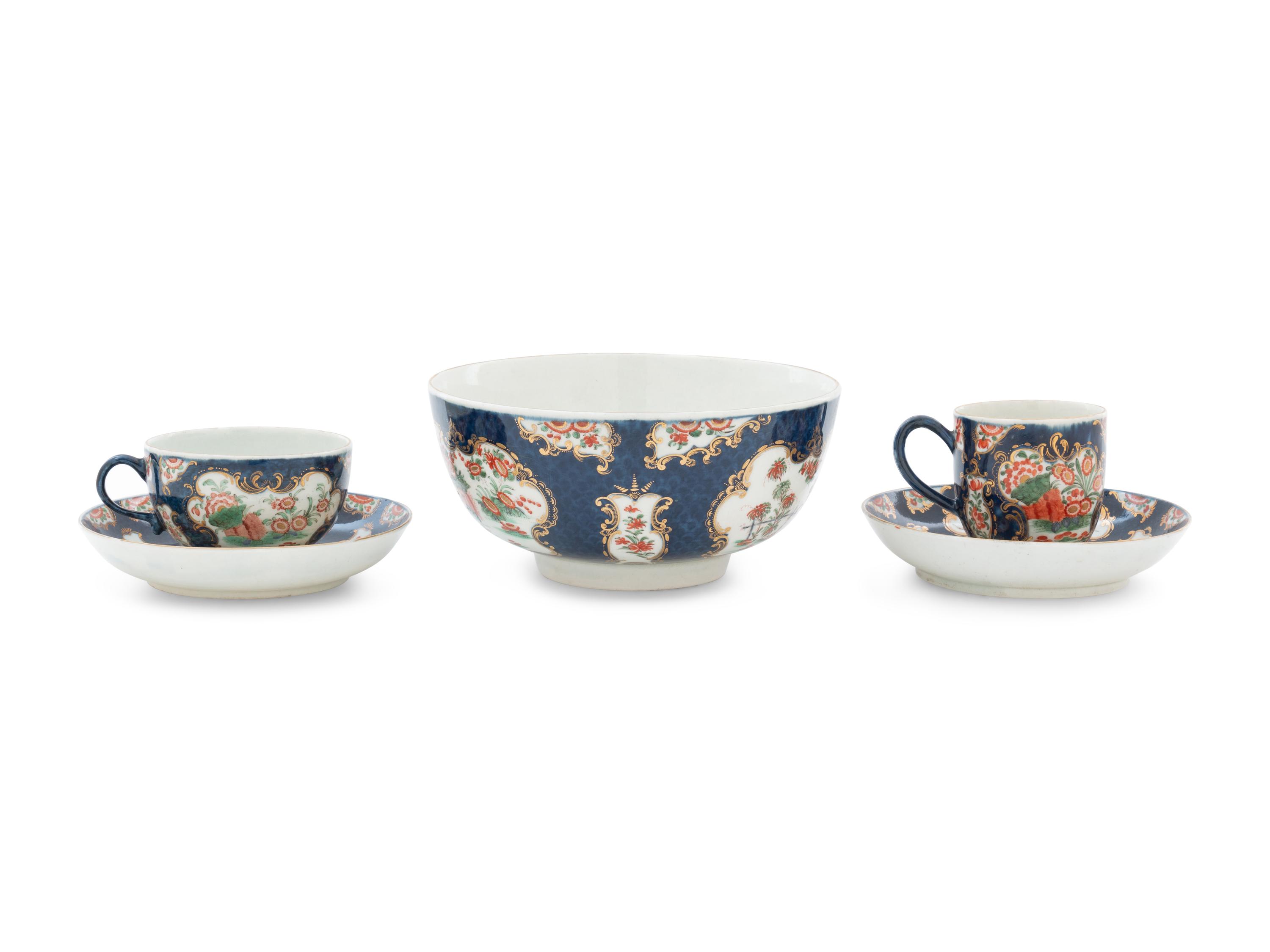 A Royal Worcester Painted and Parcel Gilt Porcelain Tea and Coffee Service