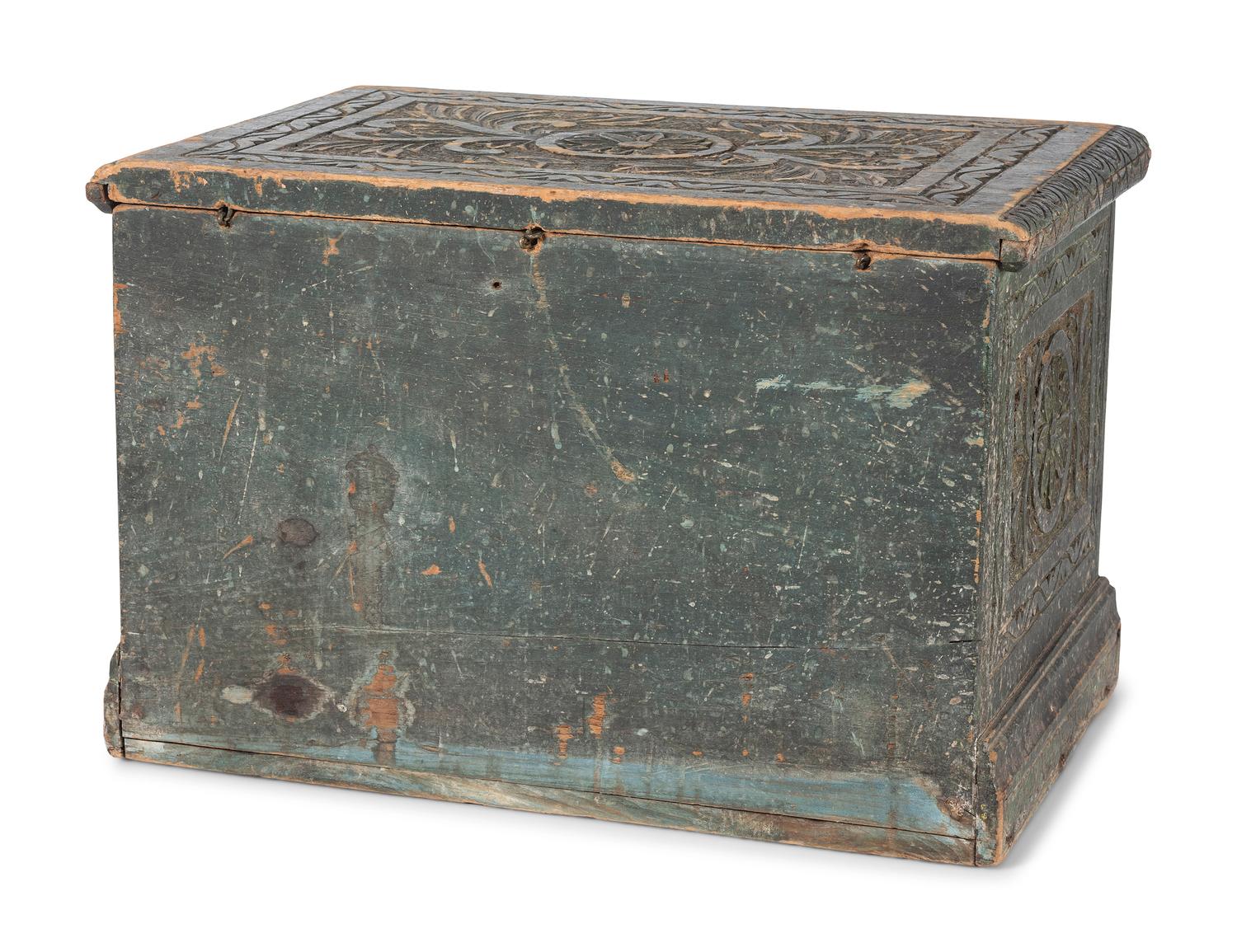 An Indonesian Carved and Painted Wood Trunk