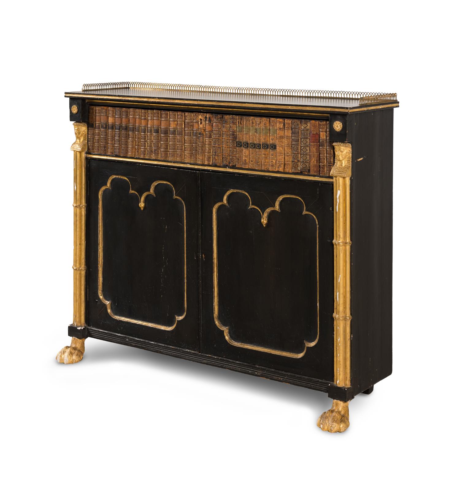 A Regency Black-Painted, Parcel-Gilt and Faux Book Front Cabinet