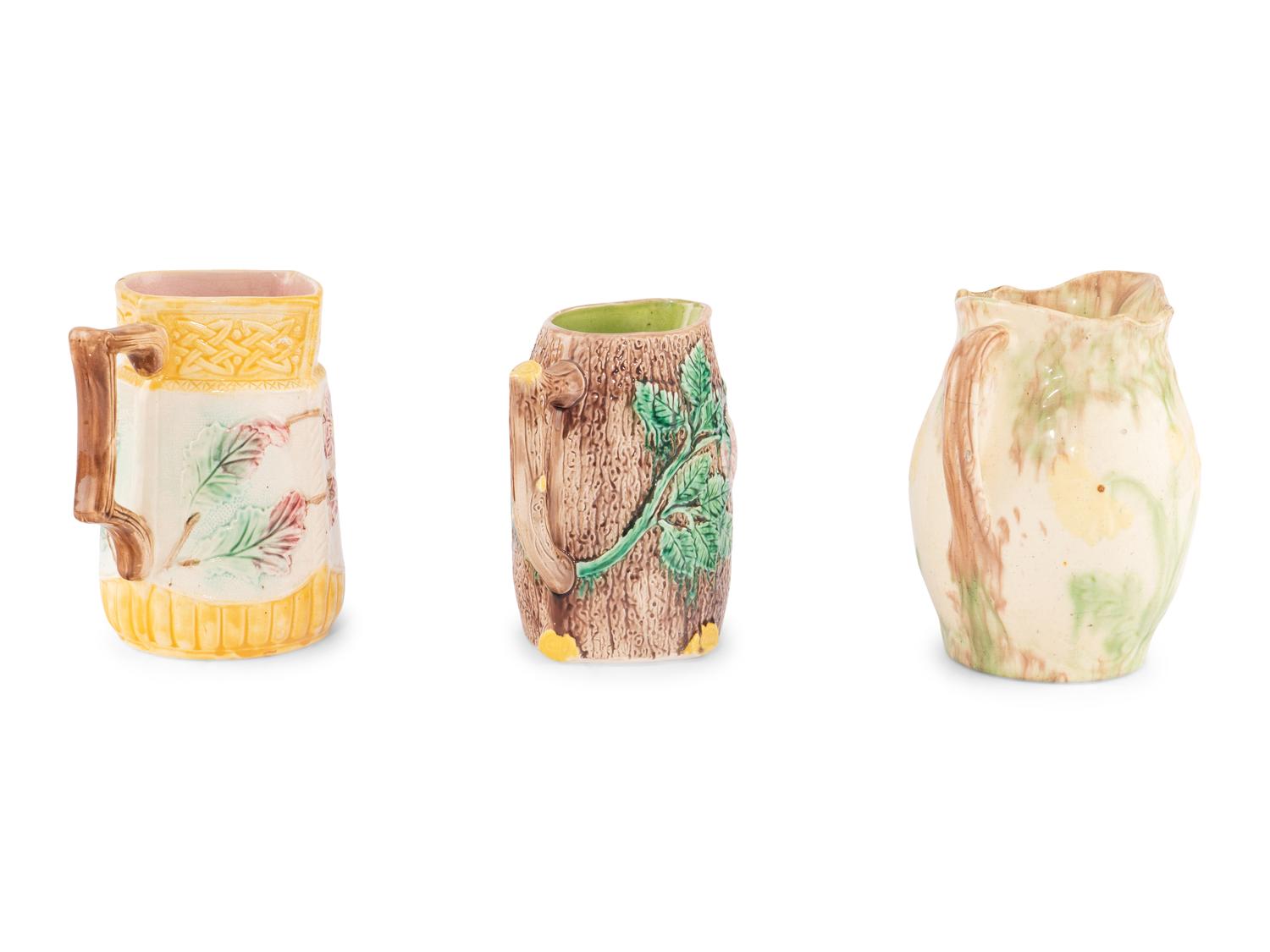 Three Large Glazed Earthenware Pitchers