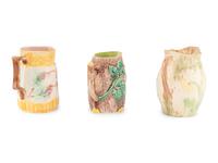 Three Large Glazed Earthenware Pitchers