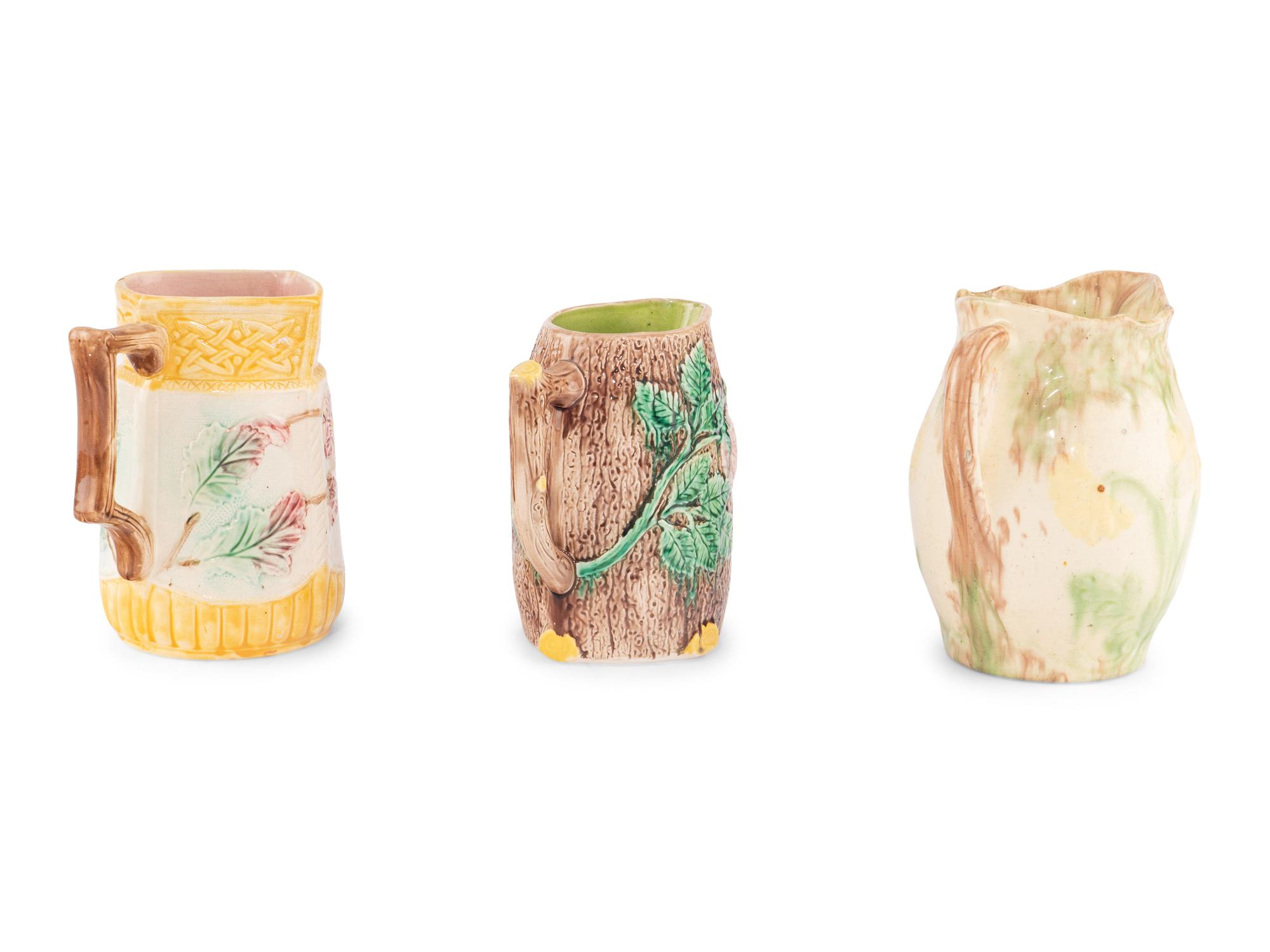 Three Large Glazed Earthenware Pitchers
