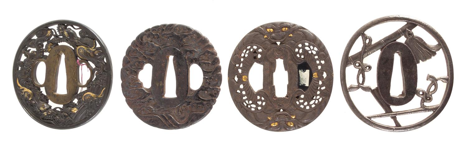 Four Metal Tsubas Height of largest 2 3/4 inches. — 19TH CENTURY