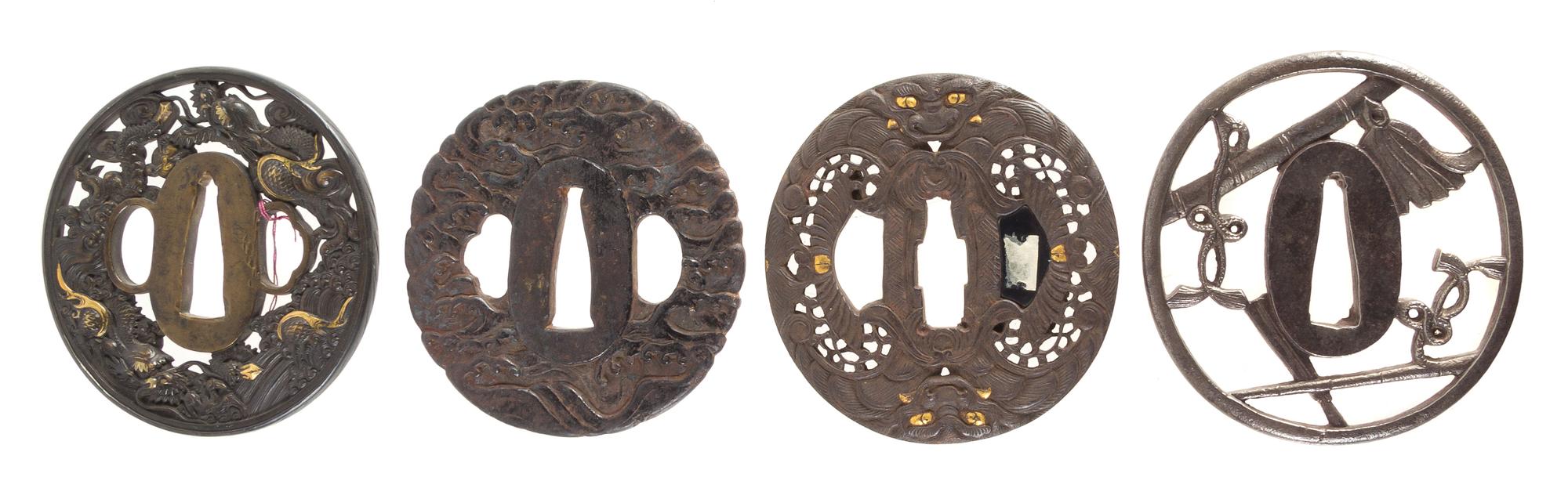 Four Metal Tsubas Height of largest 2 3/4 inches. — 19TH CENTURY