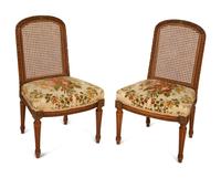 A Pair of Italian Louis XVI Style Gilt Metal Mounted Mahogany and Canework Side Chairs