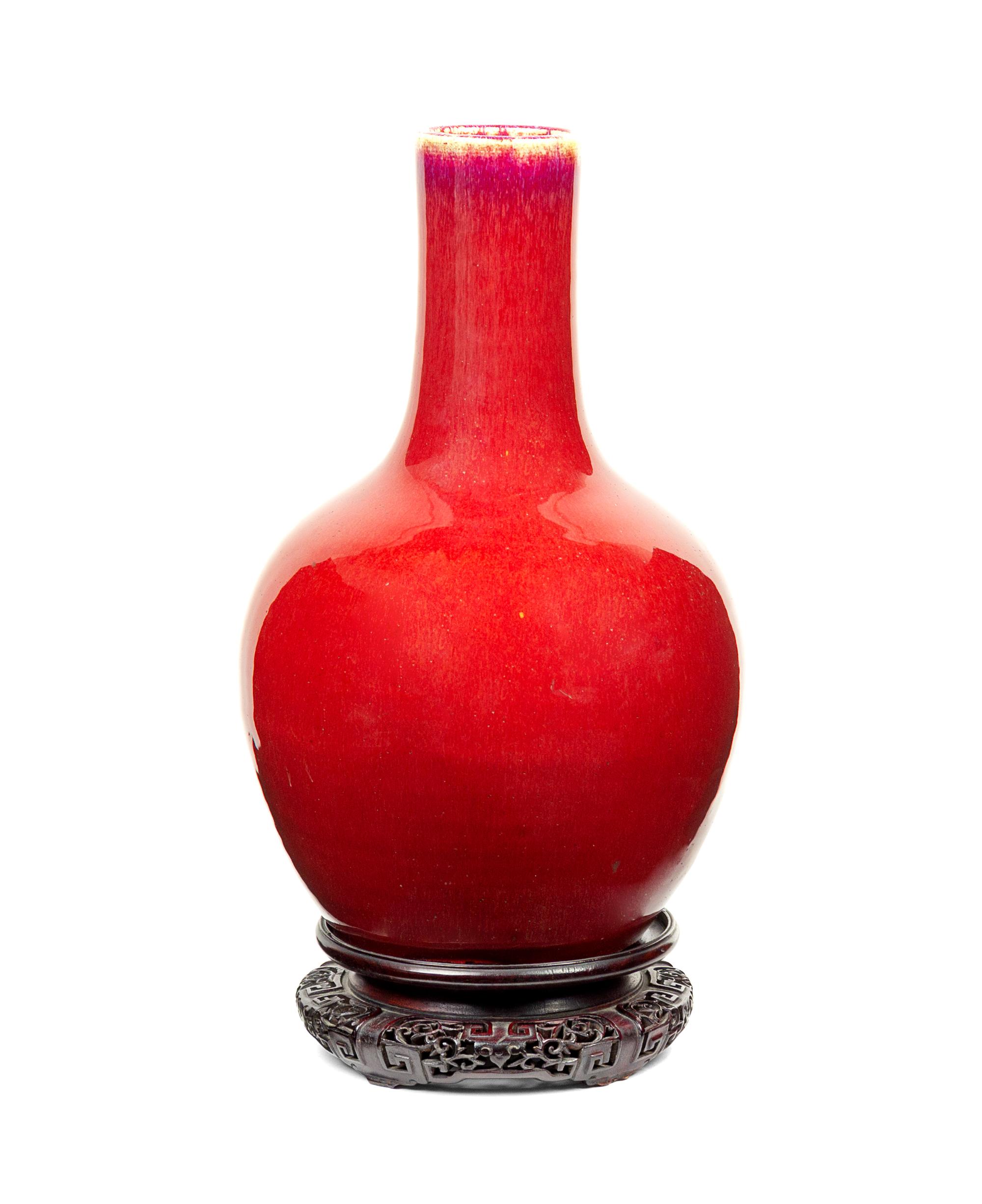 A Copper Red Glazed Porcelain Bottle Vase Height 14 3/4 inches. — 18TH/19TH CENTURY