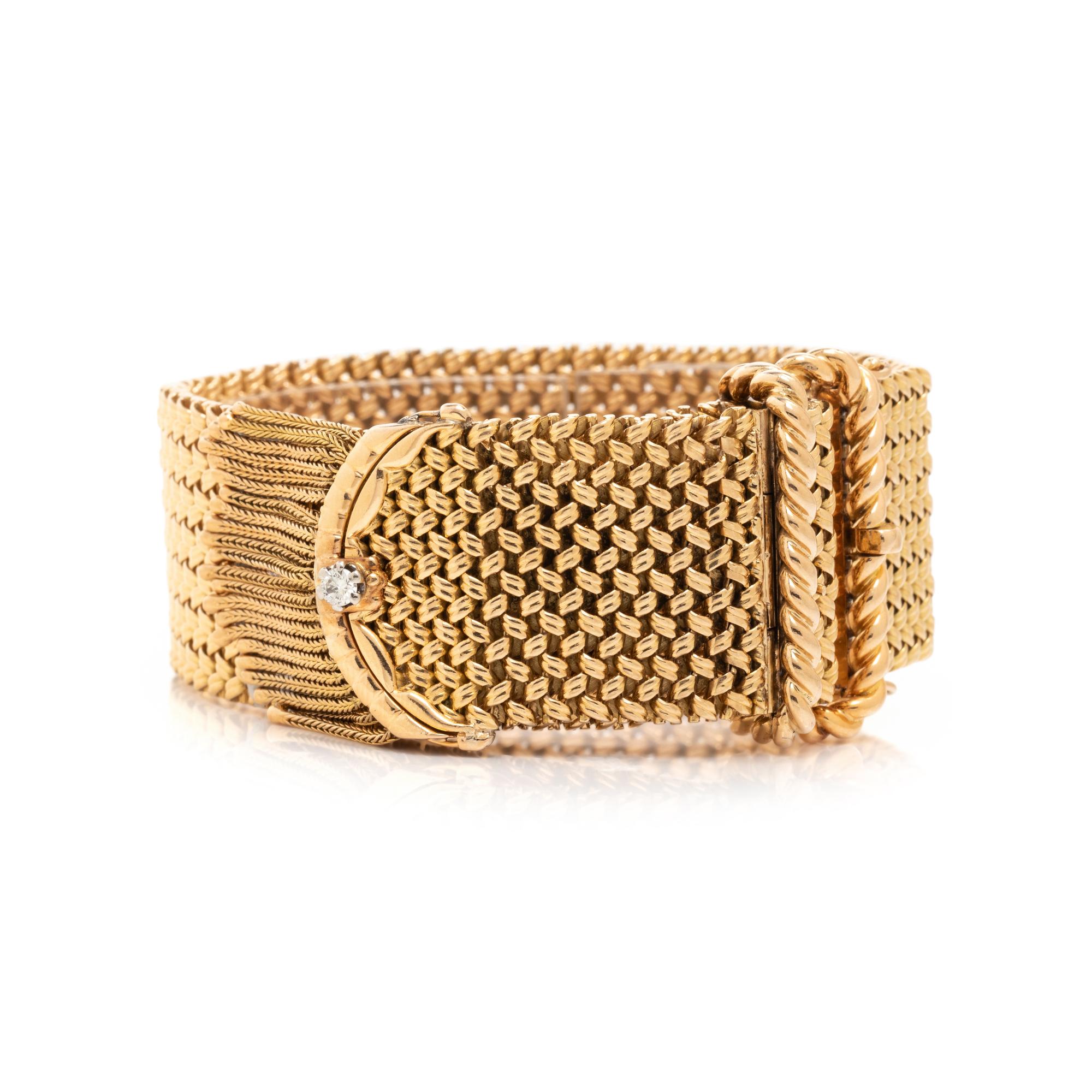 FRENCH, GOLD AND DIAMOND SURPRISE WATCH