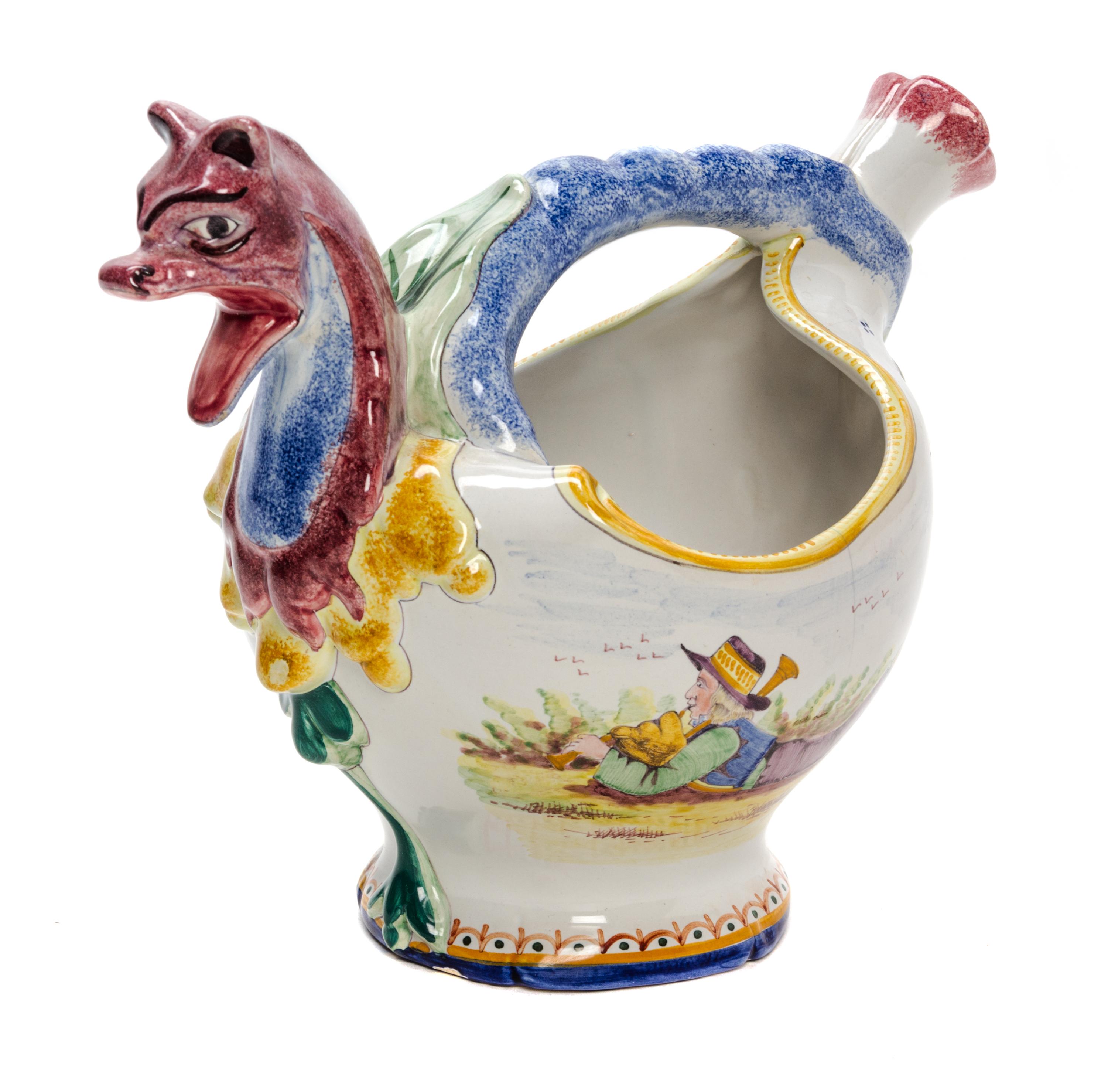 A Quimper Pottery Jug Height 8 3/4 inches.