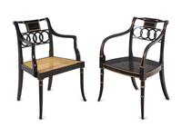 Thirteen Baker Regency Style Ebonized and Parcel Gilt Cane Seat Armchairs