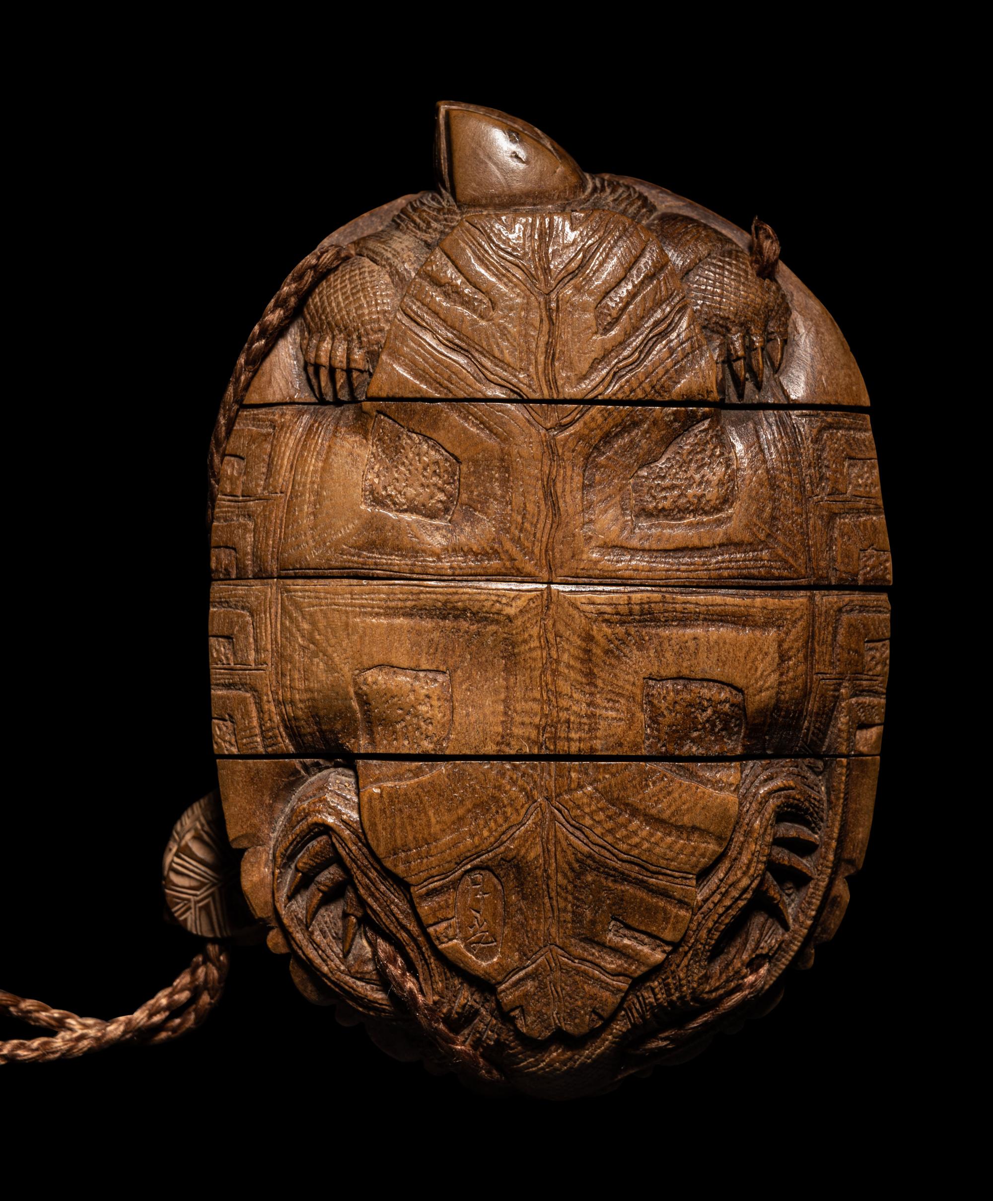 A Japanese Terrapin-Form Boxwood Three- Case Inro, Ojime and Netsuke