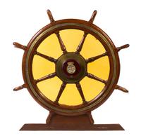 An Ornamental Brass Mounted Oak Ship's Wheel Diameter 53 7/8 inches.
