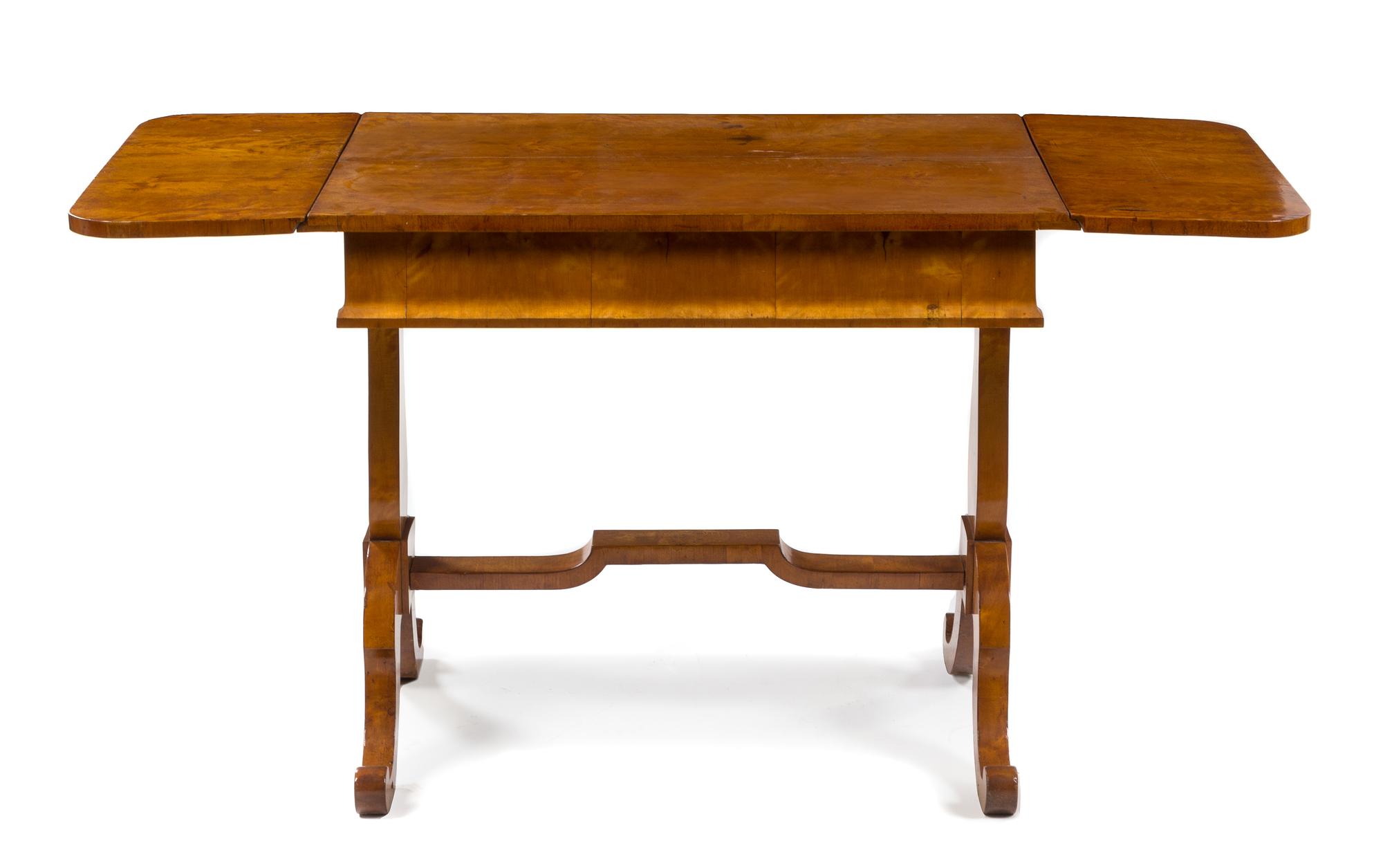 An Austrian Birch Sofa Table Height 30 1/2 x width 37 x depth 24 1/2 inches. — VIENNA, EARLY 19TH CENTURY