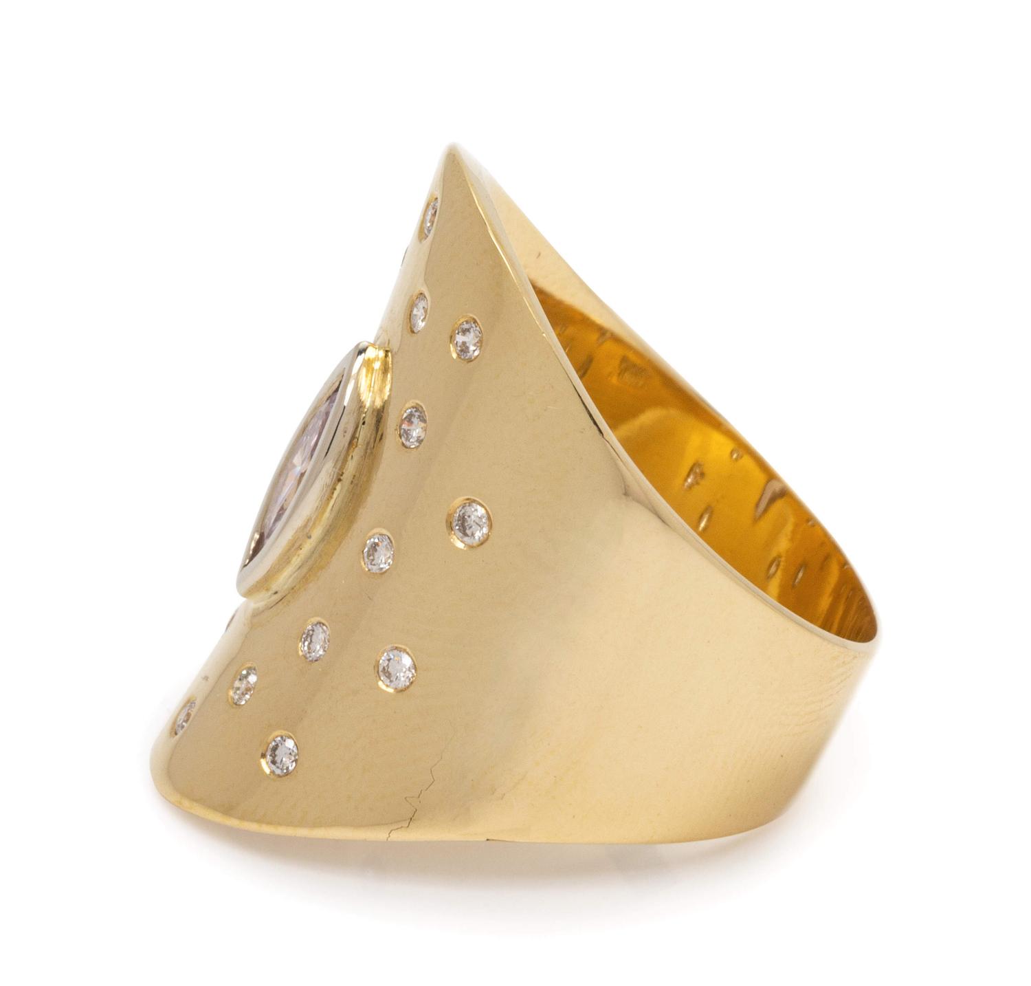 A 14 Karat Yellow Gold and Diamond Ring,