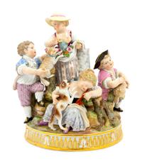 A Meissen Porcelain Figural Group of Children with Lambs and a Dog