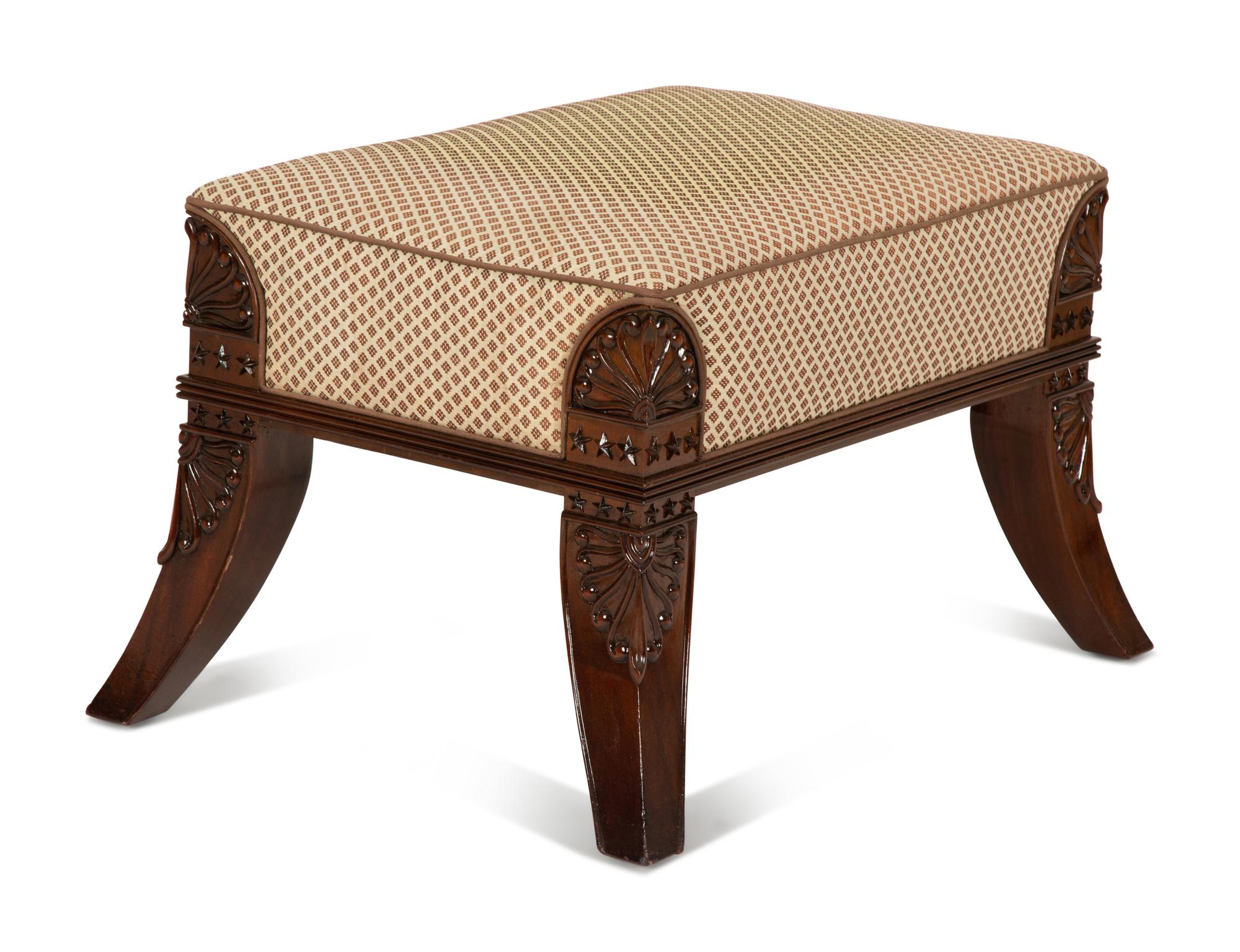 An Egyptian Revival Carved Mahogany Ottoman with Upholstered Seat — 20th Century