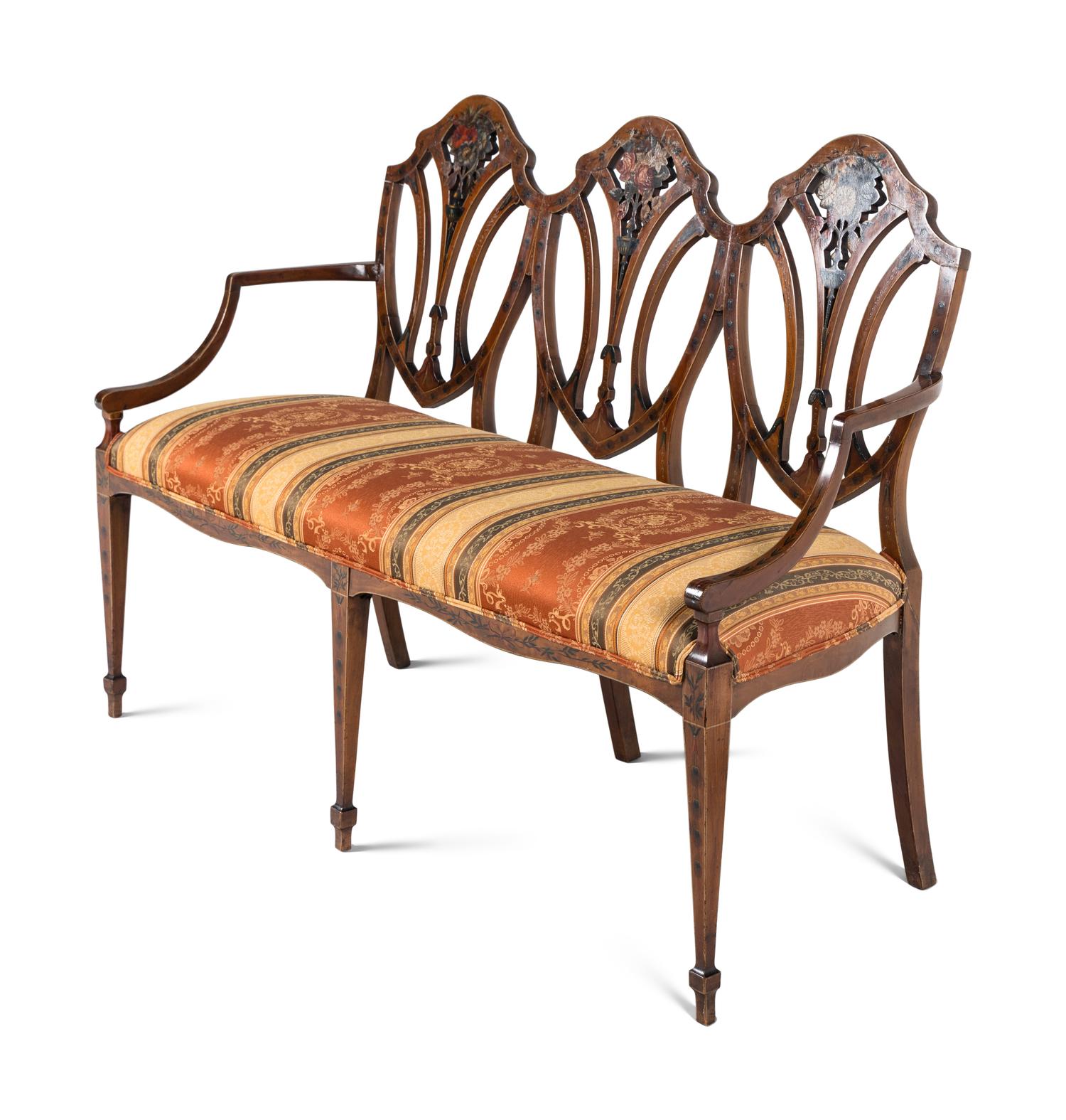 An Edwardian Painted Satinwood Triple-Back Settee and Armchair