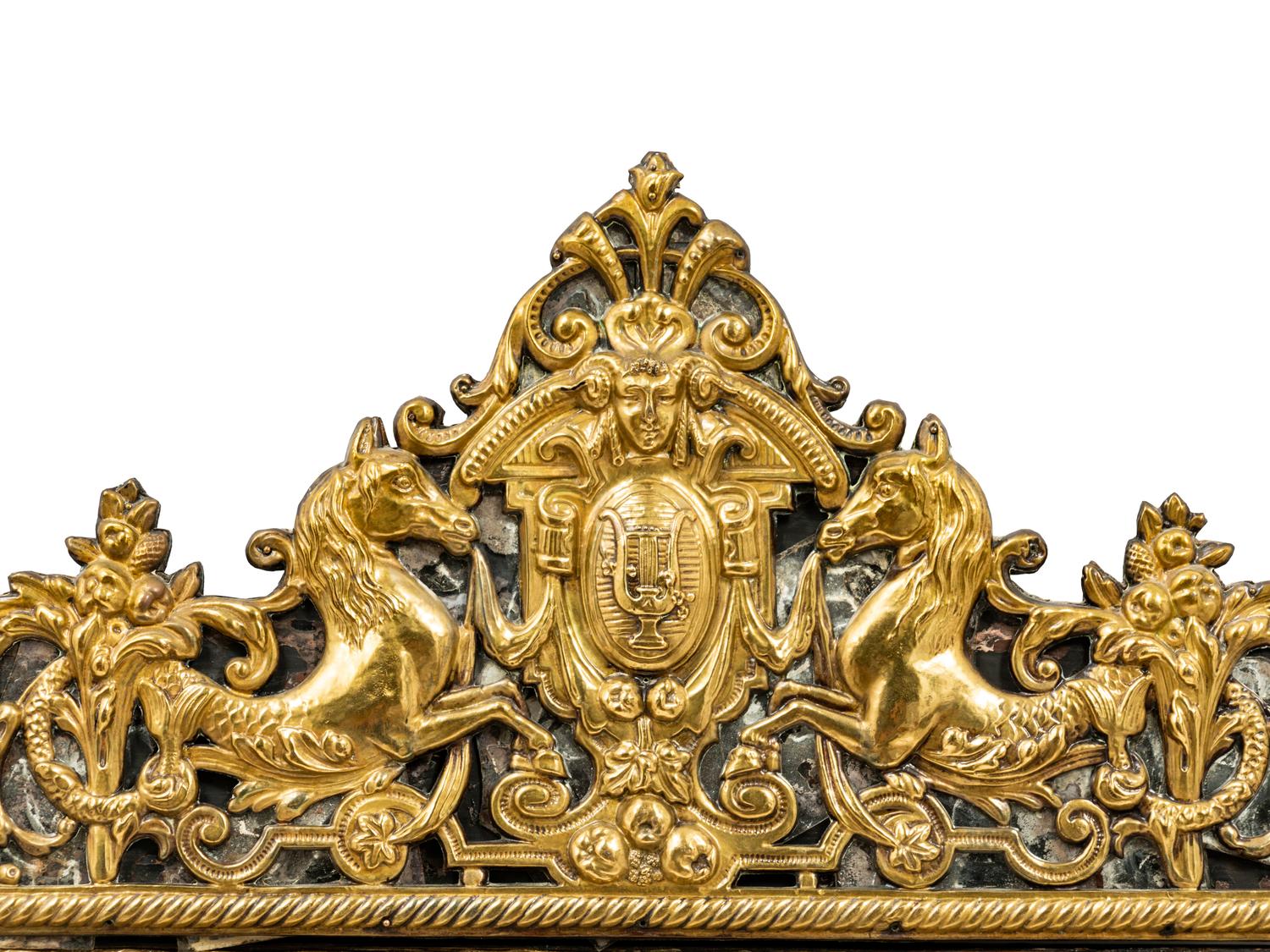 A Brass Embossed Venetian Style Mirror