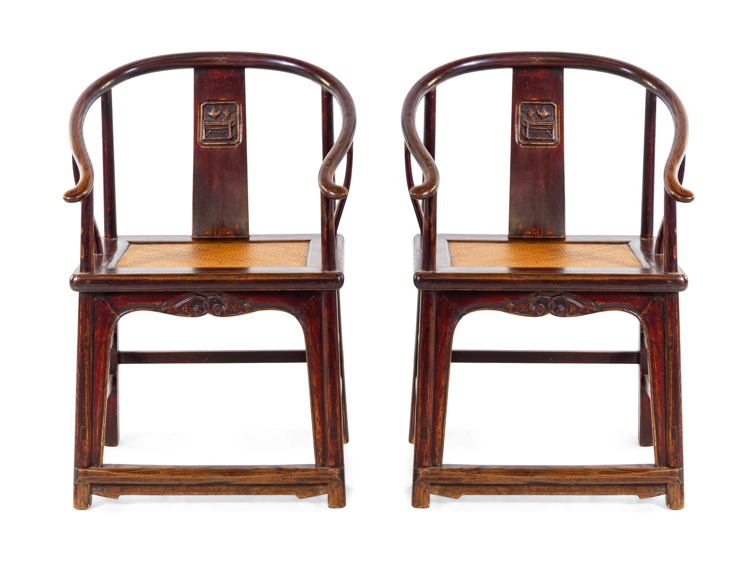 A Pair of Chinese Elmwood Horseshoe-Back Armchairs
