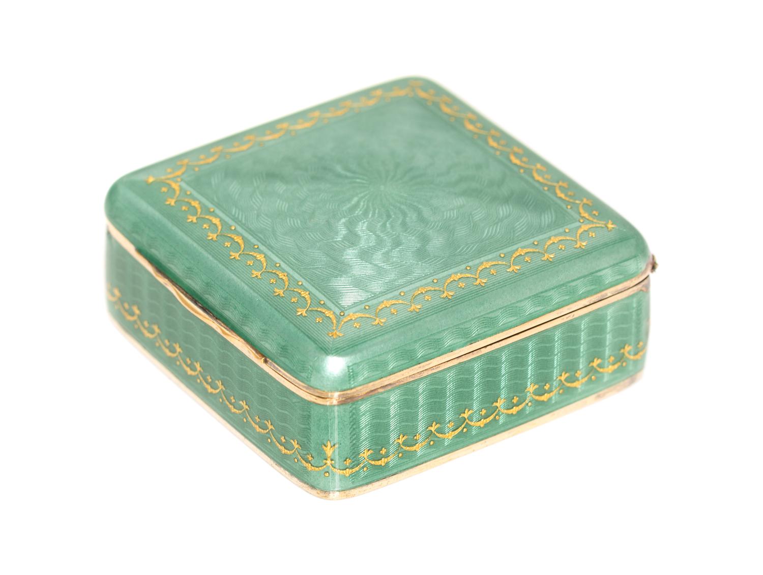 A Continental Parcel Gilt Silver and Enamel Box, , having a gilt festoon border with geometric guilloche enamel decoration.