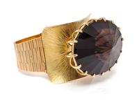 A Yellow Gold and Smokey Quartz Bracelet, Heikki Seppa, 105.70 dwts.