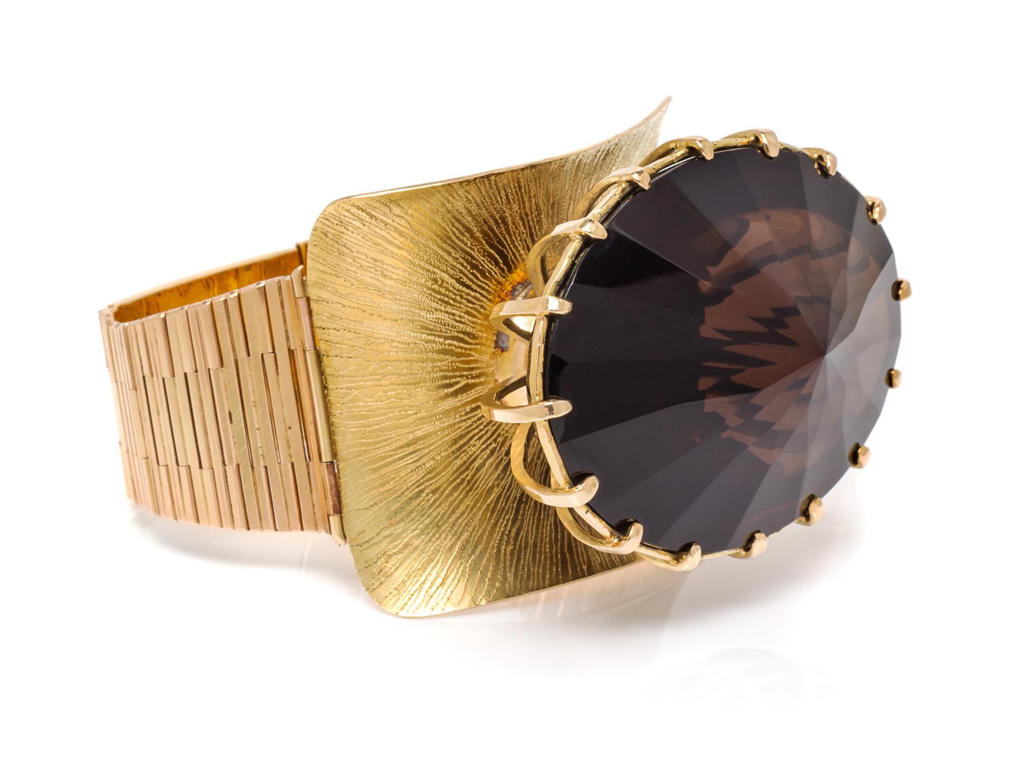 A Yellow Gold and Smokey Quartz Bracelet, Heikki Seppa, 105.70 dwts.