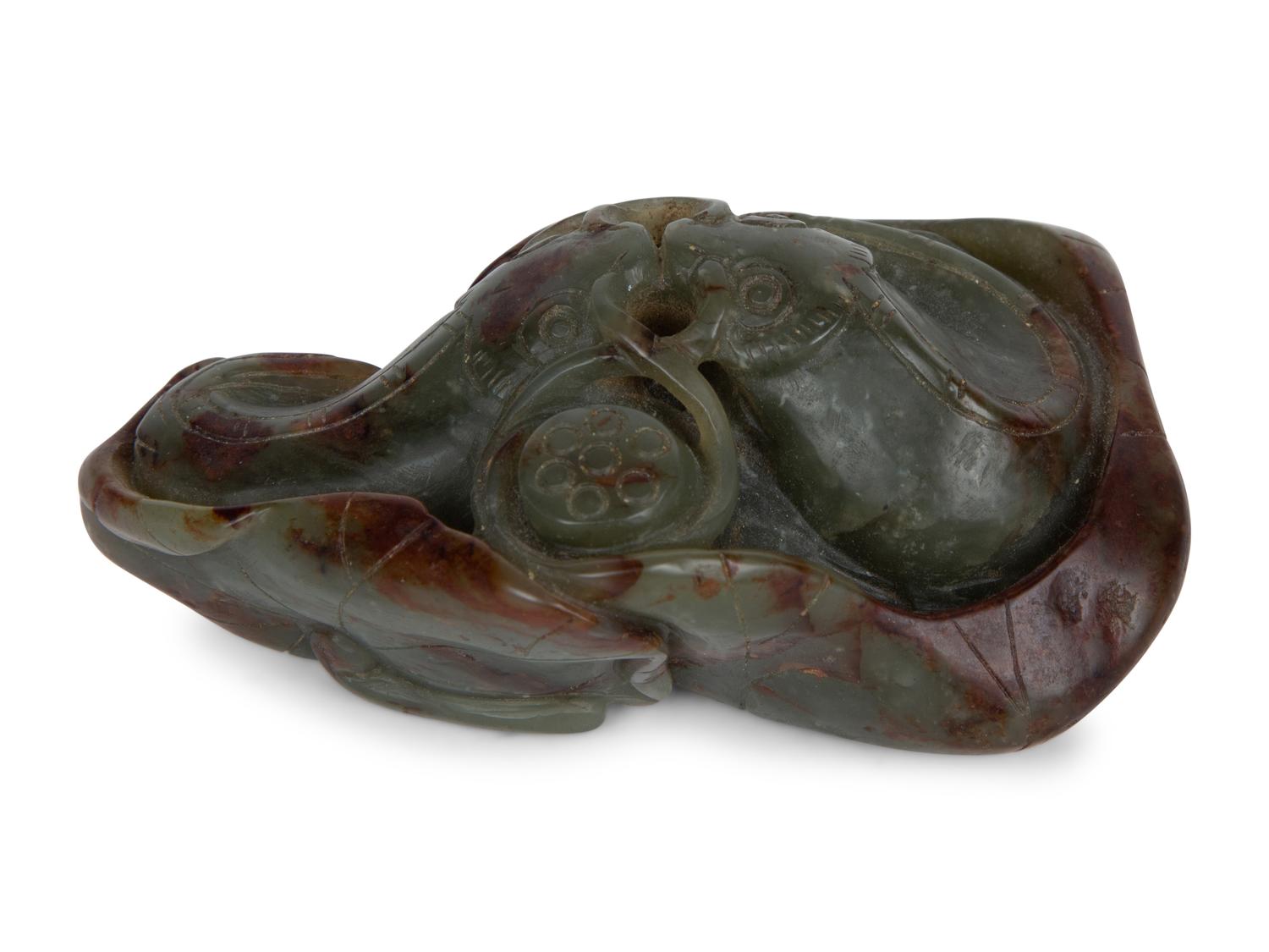 A Chinese Carved Jade Double Carp on Lily Pad — 20TH CENTURY
