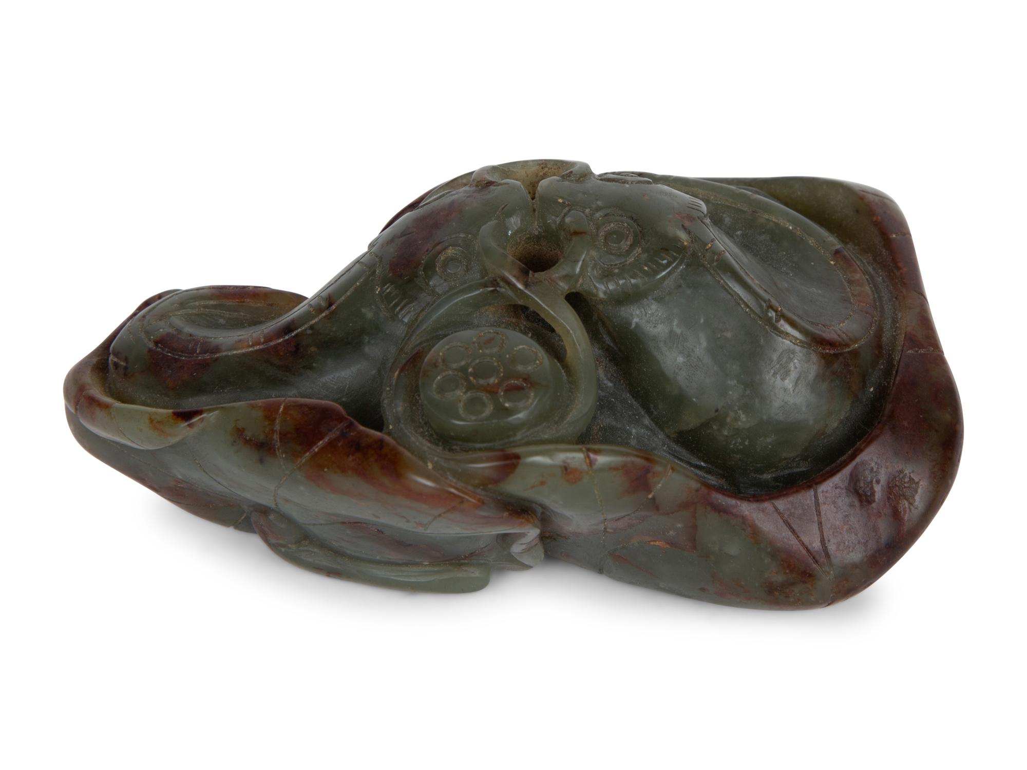 A Chinese Carved Jade Double Carp on Lily Pad — 20TH CENTURY