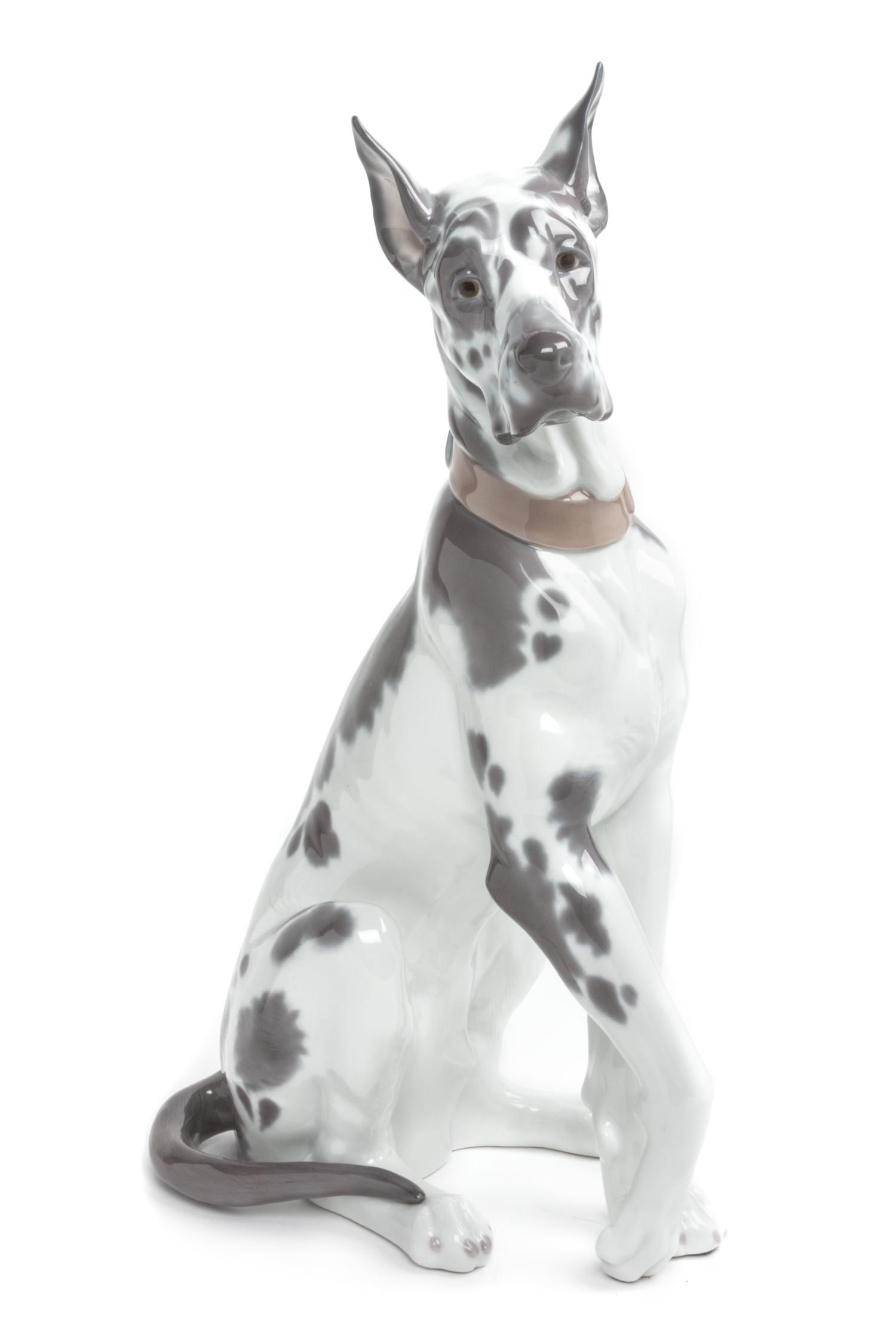 A Lladro Porcelain Figure Height 8 3/4 inches. — 20TH CENTURY