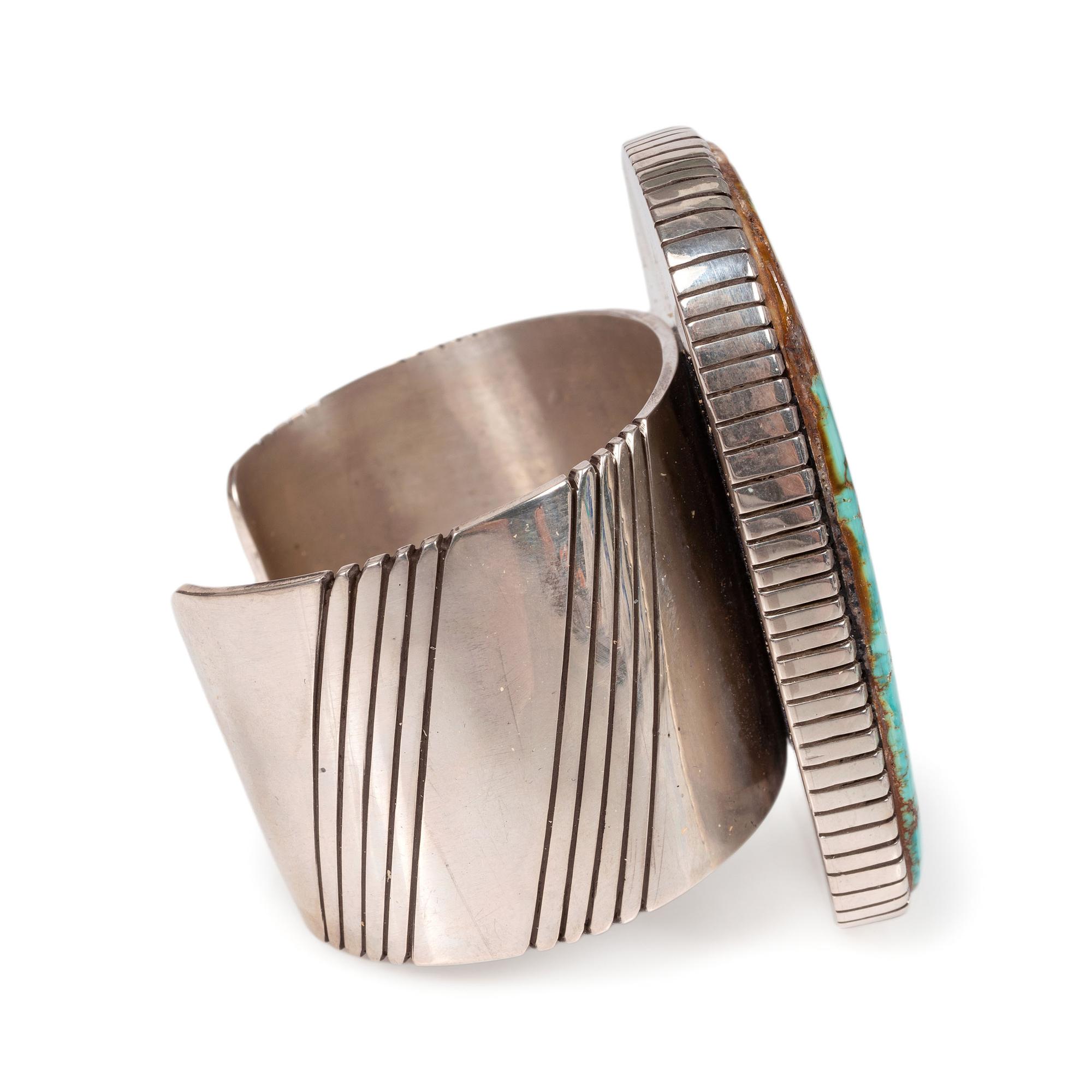 A Large Sterling Silver and Blue Gem Turquoise Cuff Bracelet