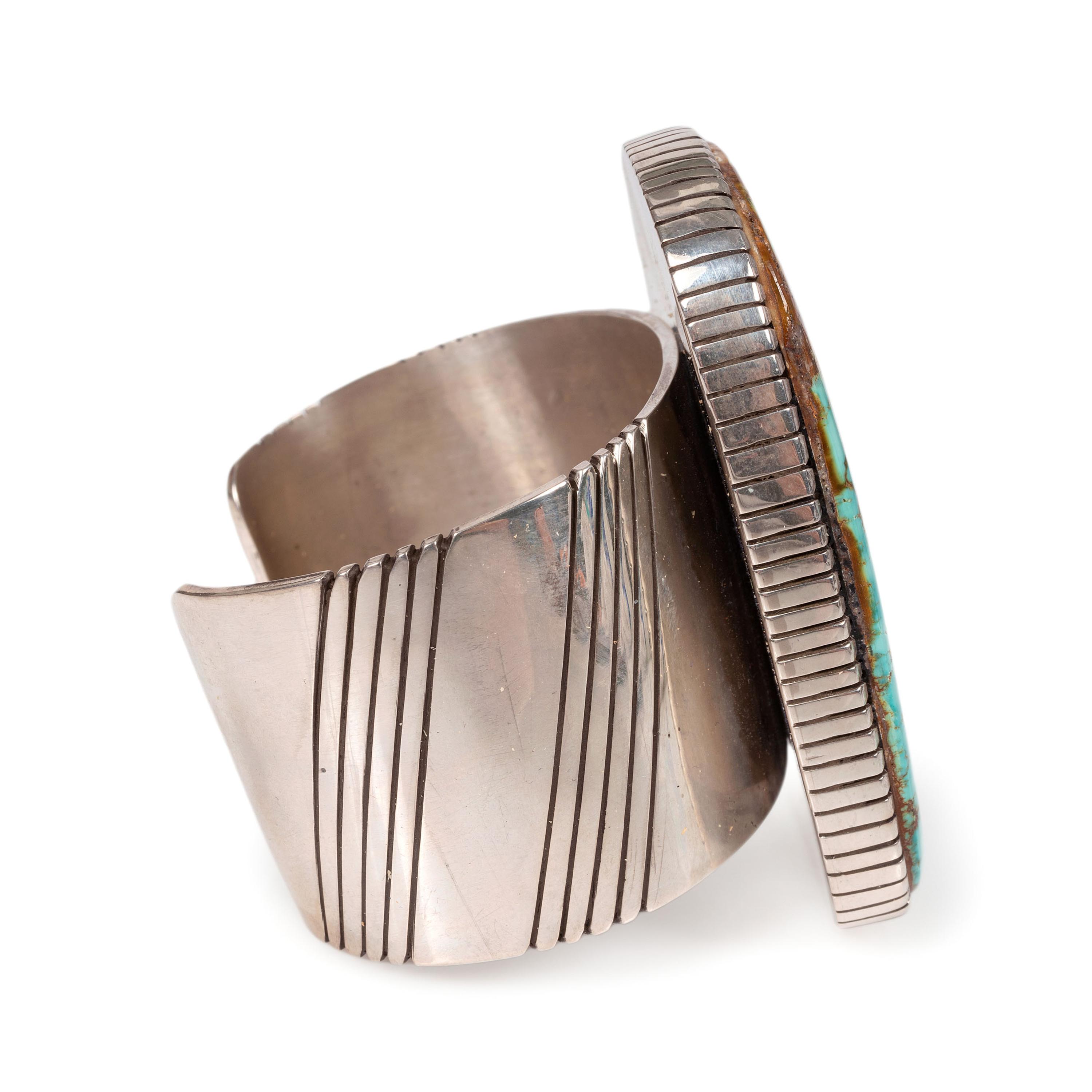 A Large Sterling Silver and Blue Gem Turquoise Cuff Bracelet