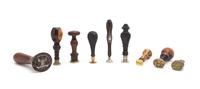 A Collection of Turned and Carved Wood Seals, Height of tallest 4 3/4 inches.
