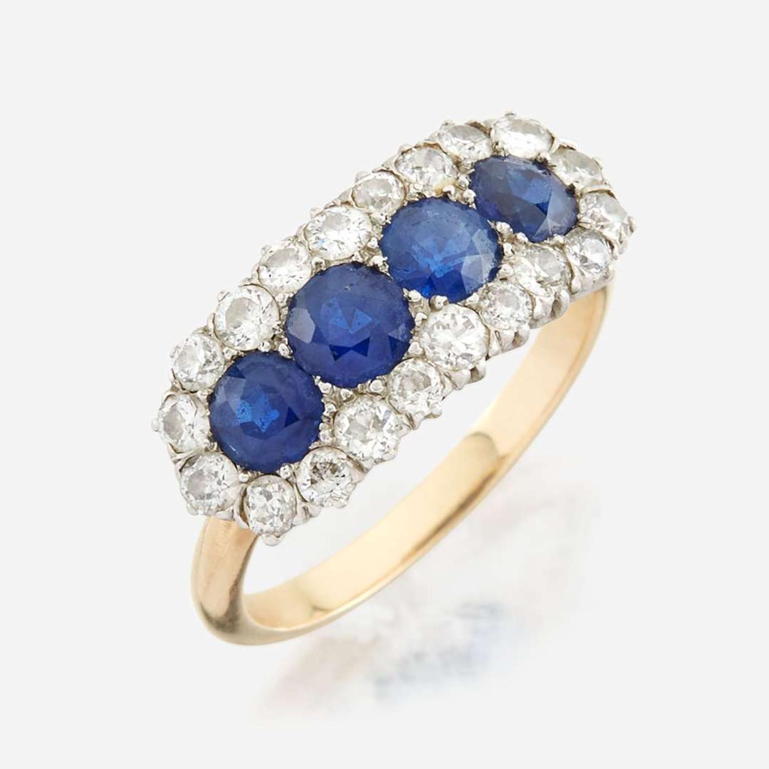 A sapphire, diamond, and gold ring