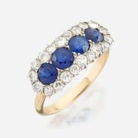 A sapphire, diamond, and gold ring