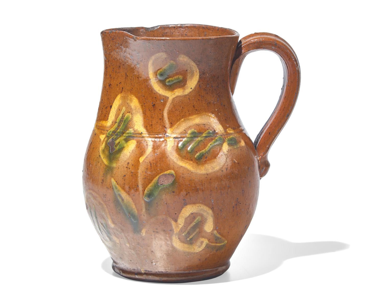 A Glazed and Slip-Decorated Redware Pitcher, Berks County, Pennsylvania, 19th Century