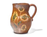 A Glazed and Slip-Decorated Redware Pitcher, Berks County, Pennsylvania, 19th Century