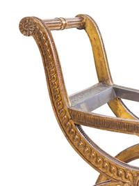 A Louis XVI Style Carved Giltwood Curule Bench