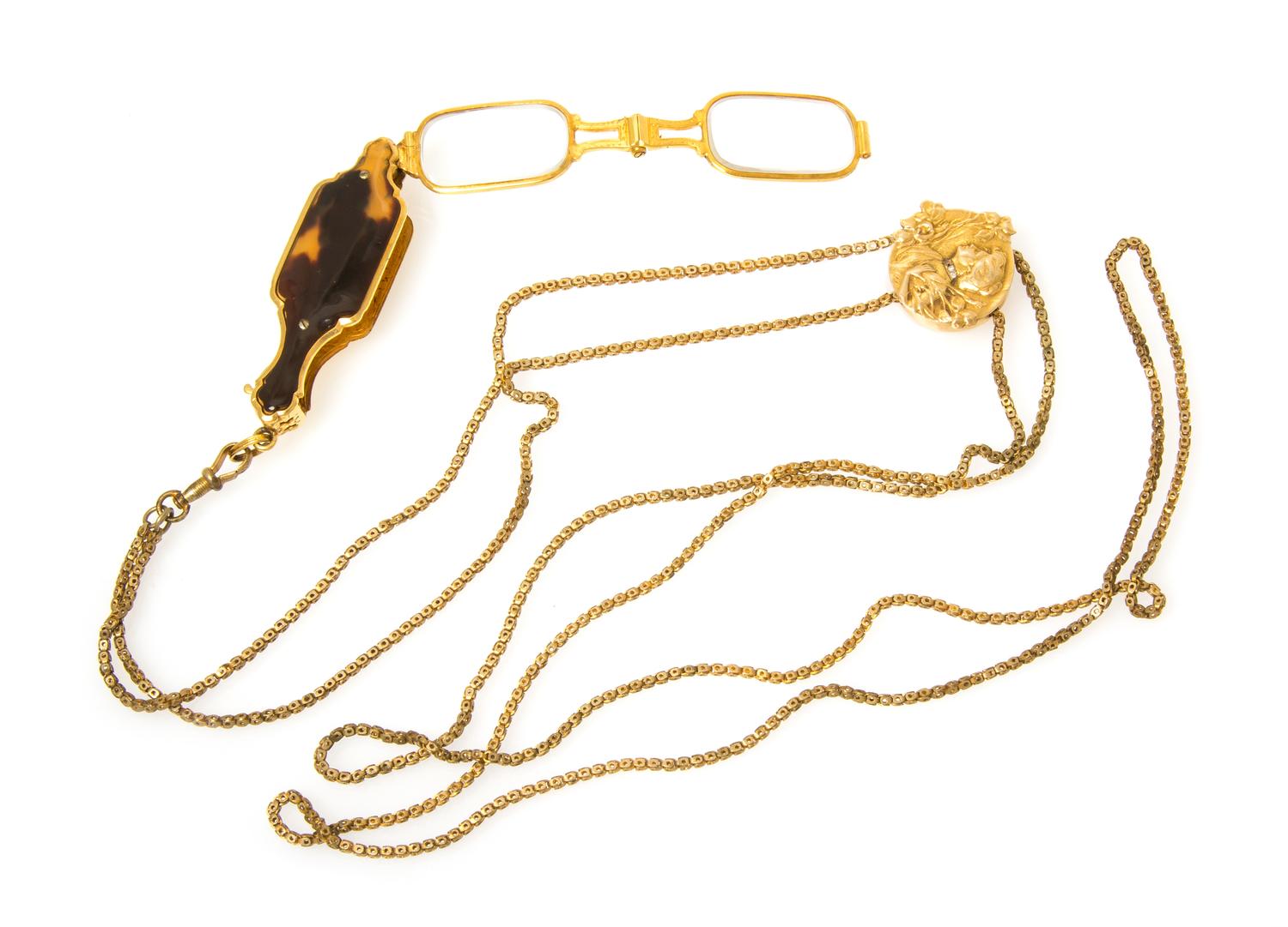 An Antique Tortoiseshell Lorgnette and Gold Slide Pendant, 30.80 dwts.